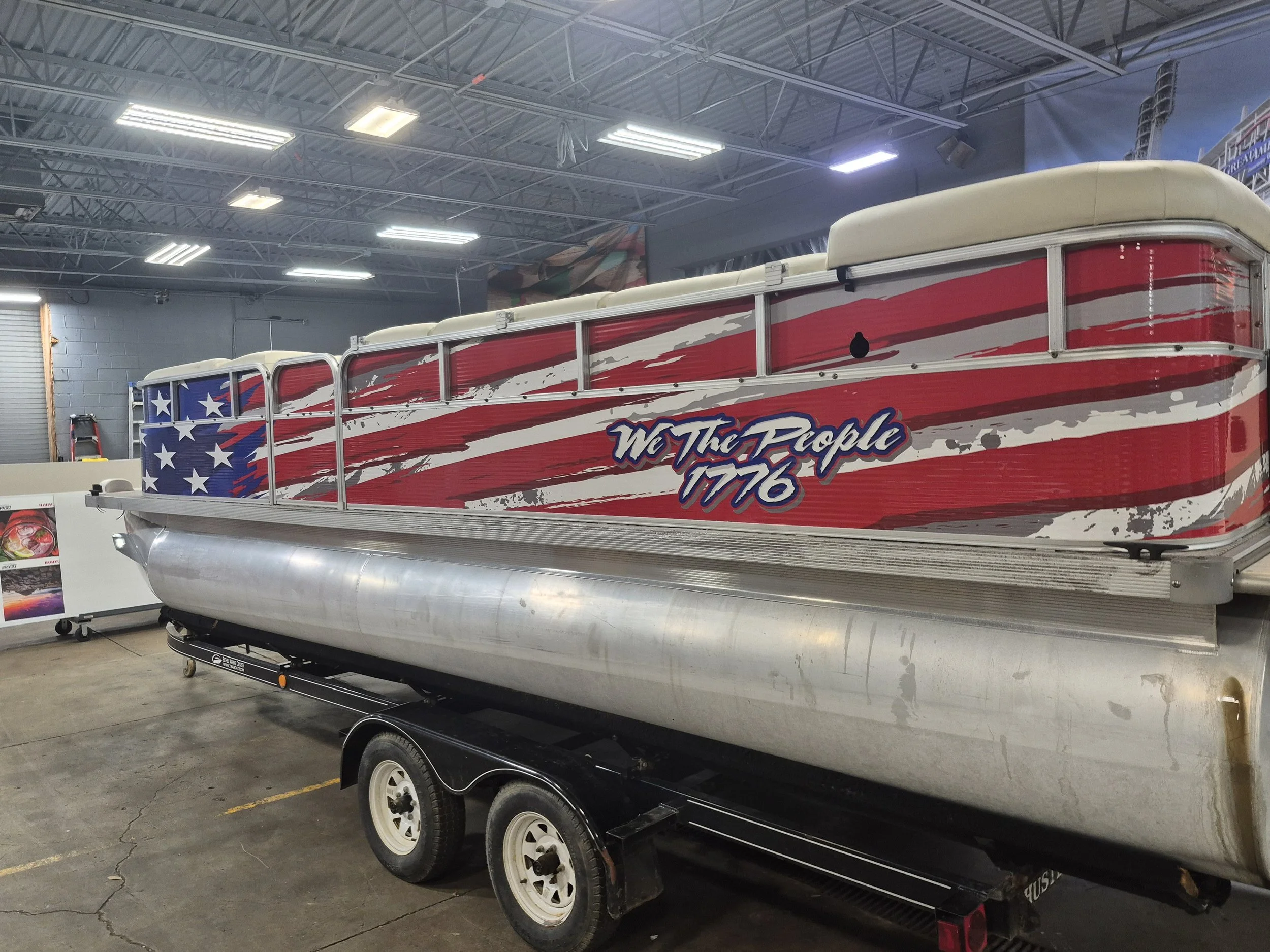 Pontoon boat wrap I designed.  This one was tricky as we had a tight turn around and were provided spotty measurements, so we had to make do and roll with the punches.