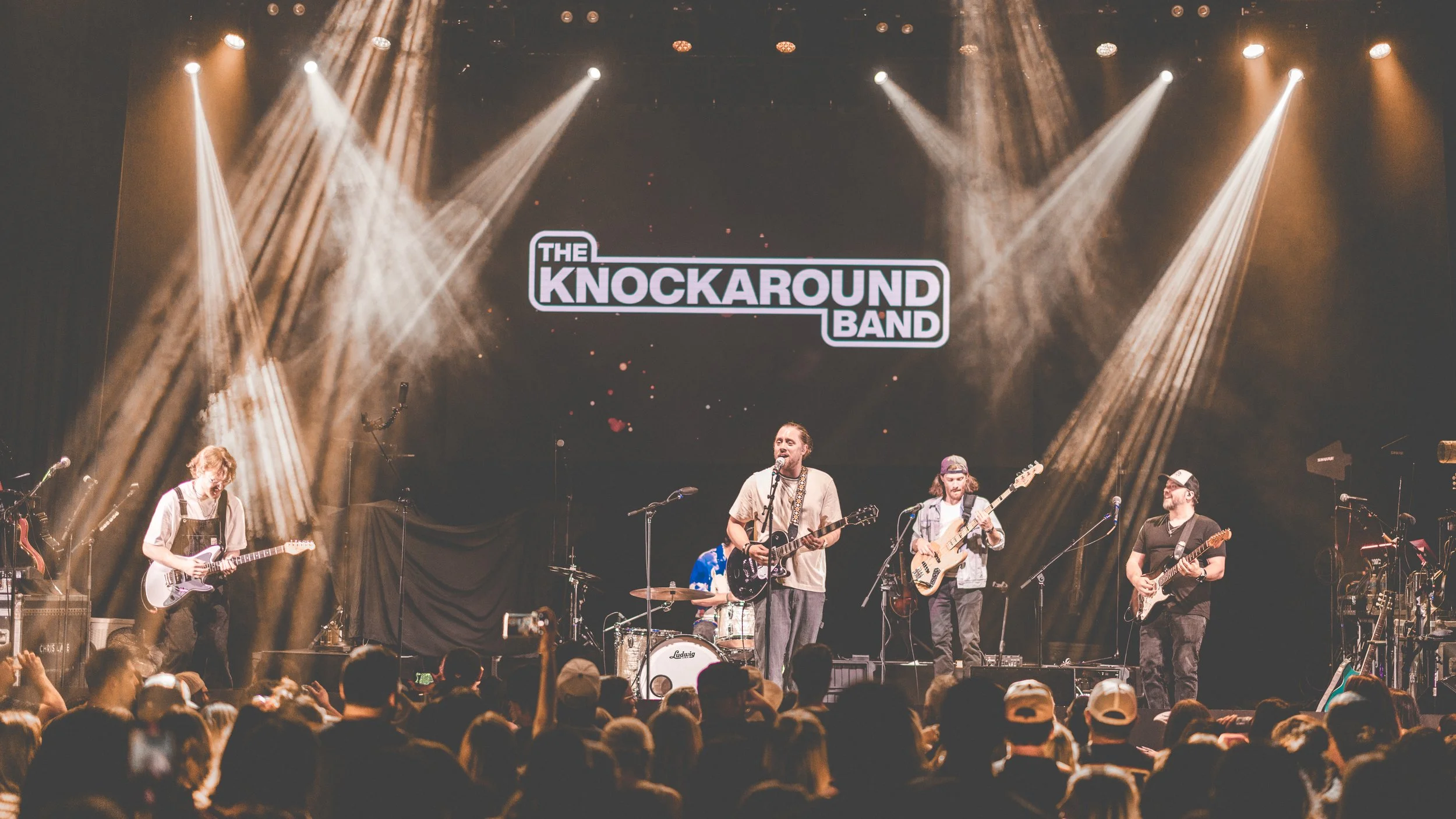 The Knockaround Band performing live in front of a sold out crowd