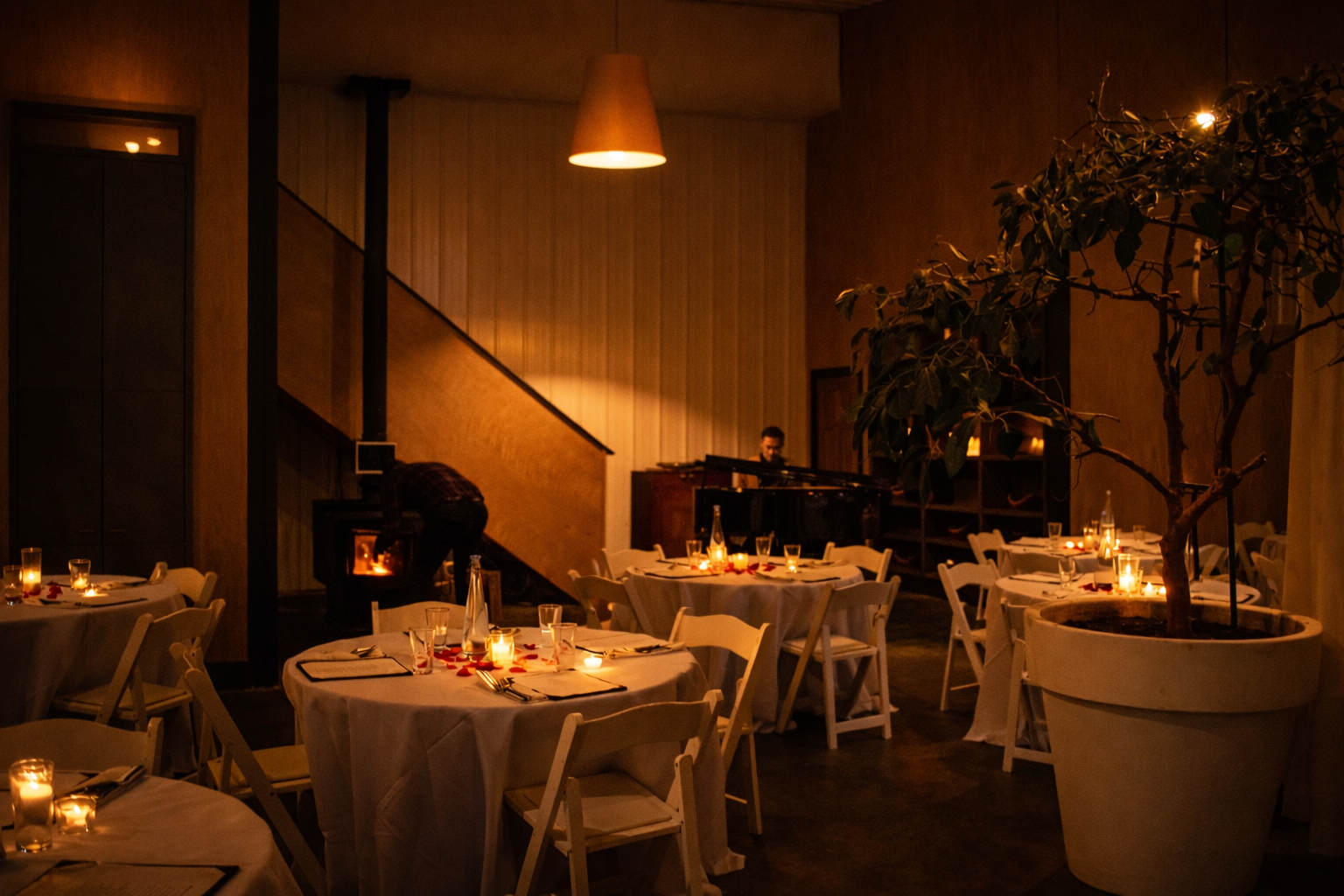 candle lit dinner by the fire.png