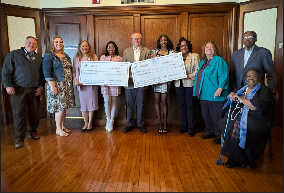 2025 winners Dasha McCary and Kortlyn Thomas with Sojourner Truth Education Committee members Adam Motter, Katie Zak, Towanda Mullins, Margaret Maurer, Charles Debose, and Jackie Debose alongside Akron Press Club officer Bruce Winges and Lawana Holla