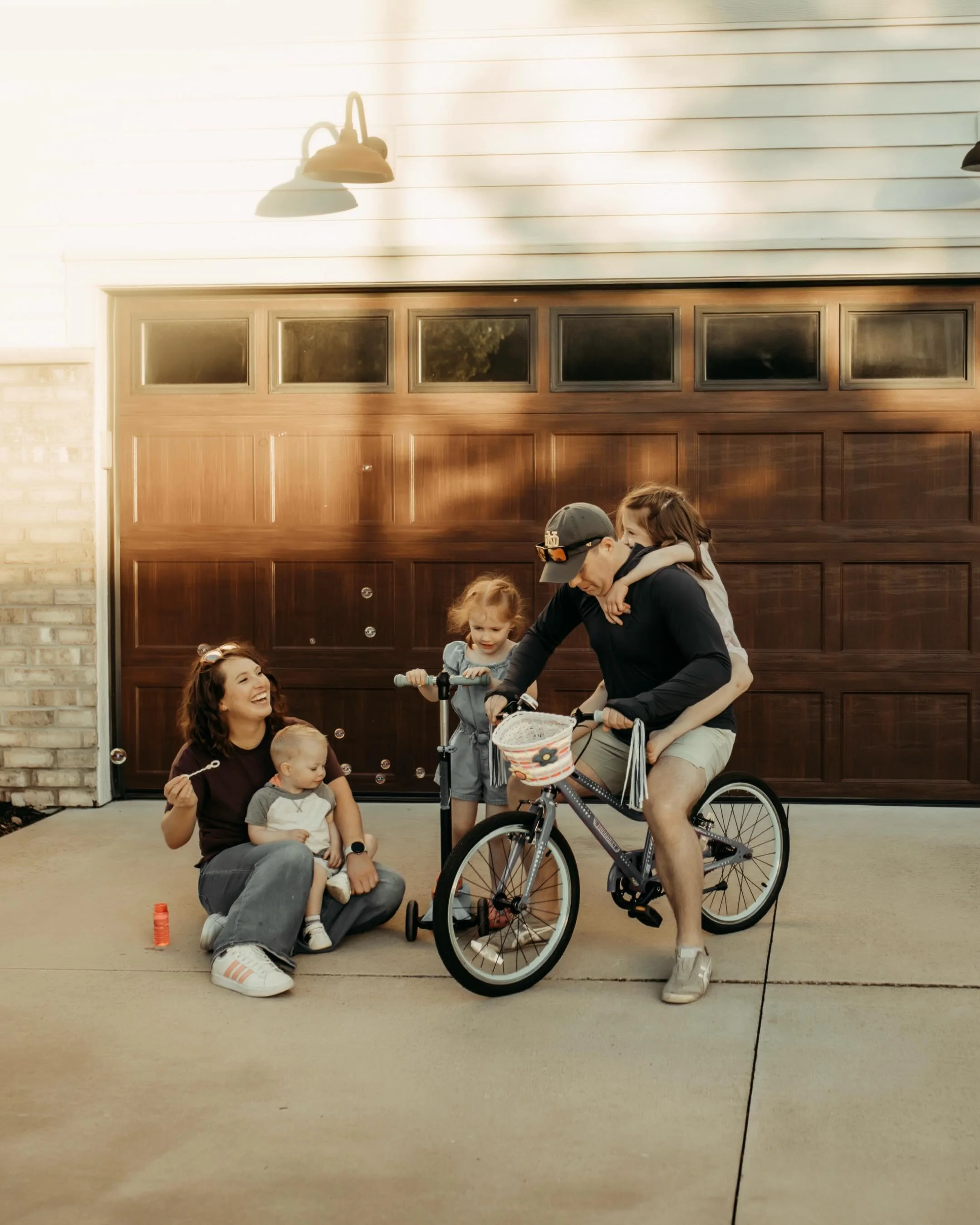 The magic of documentary photography isn&rsquo;t found in perfect poses&mdash;it&rsquo;s found in the chalk-covered hands, bubble kisses, rainbow drawings on the driveway, and melty ice cream shared on the front porch.

These are the moments that tel