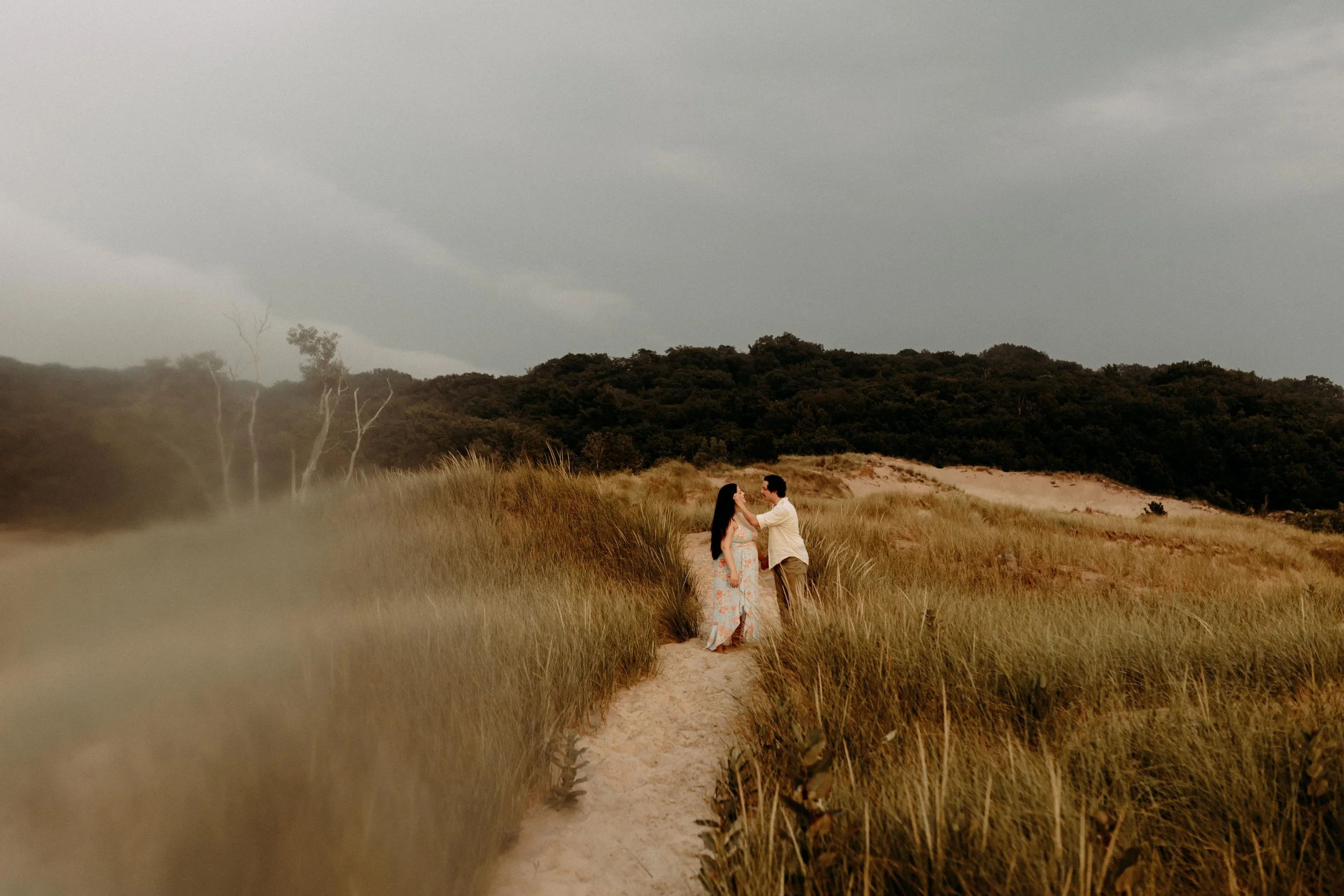 maternity photography session at the beach in saugatuck, michigan