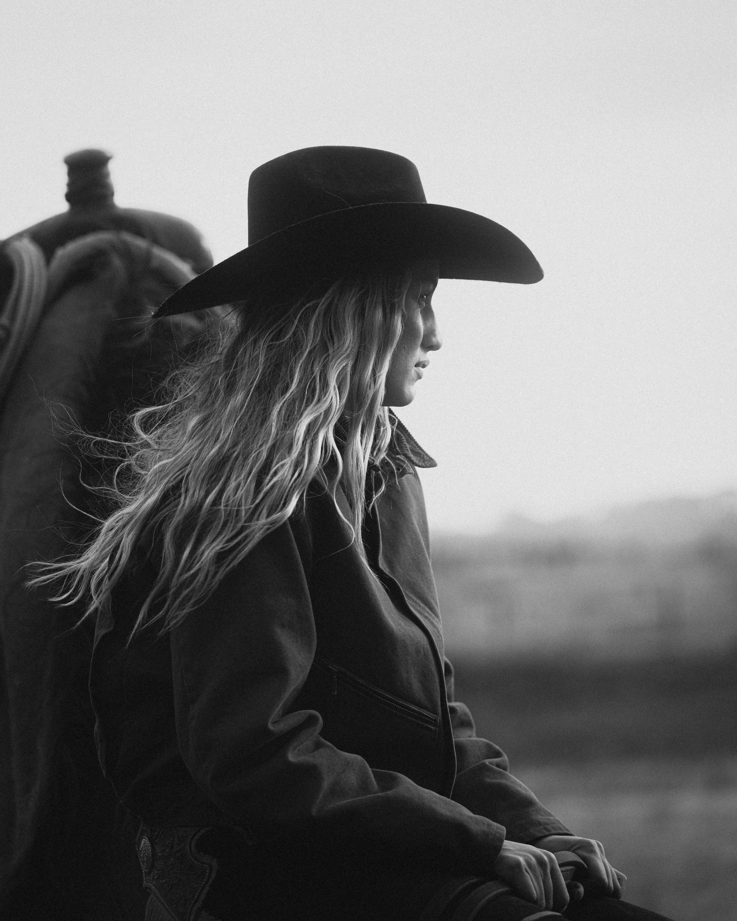 cowgirl looking out into the distance