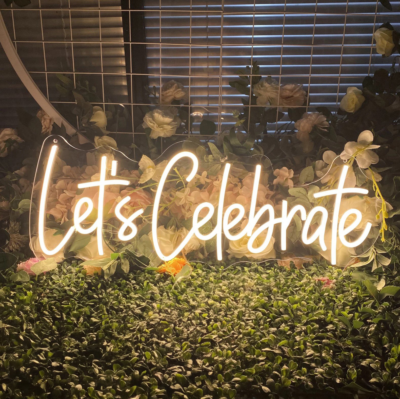 Let's Celebrate neon sign for event and party rental in Los Angeles.