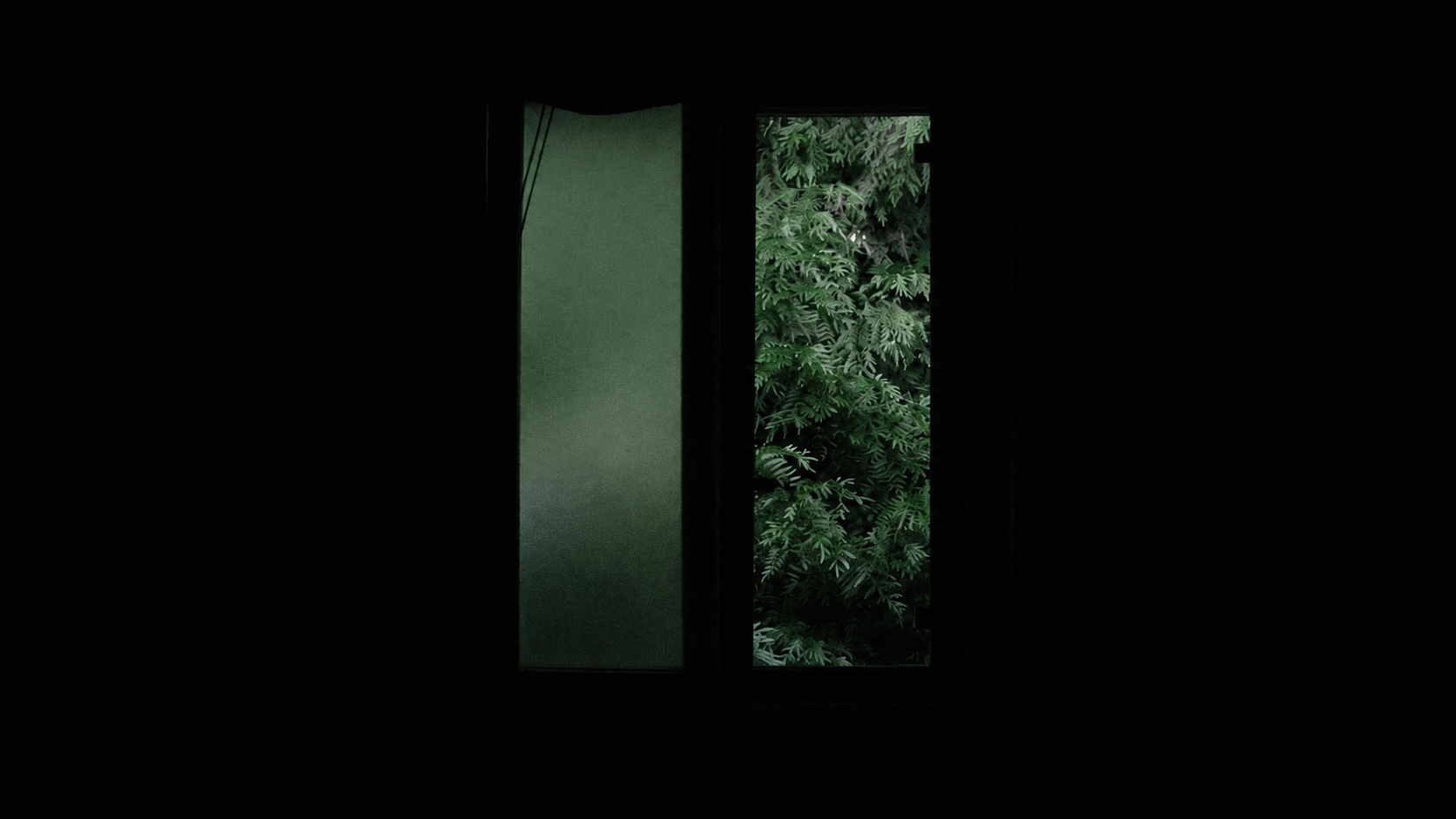 A solitary window pauses between darkness and greenery, capturing the poem’s quiet moment of stillness, distance, and suspended time.