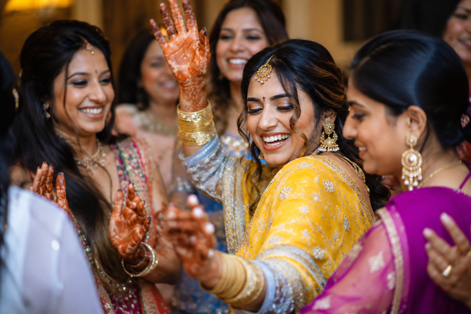 Indian wedding guests dancing during a joyful celebration