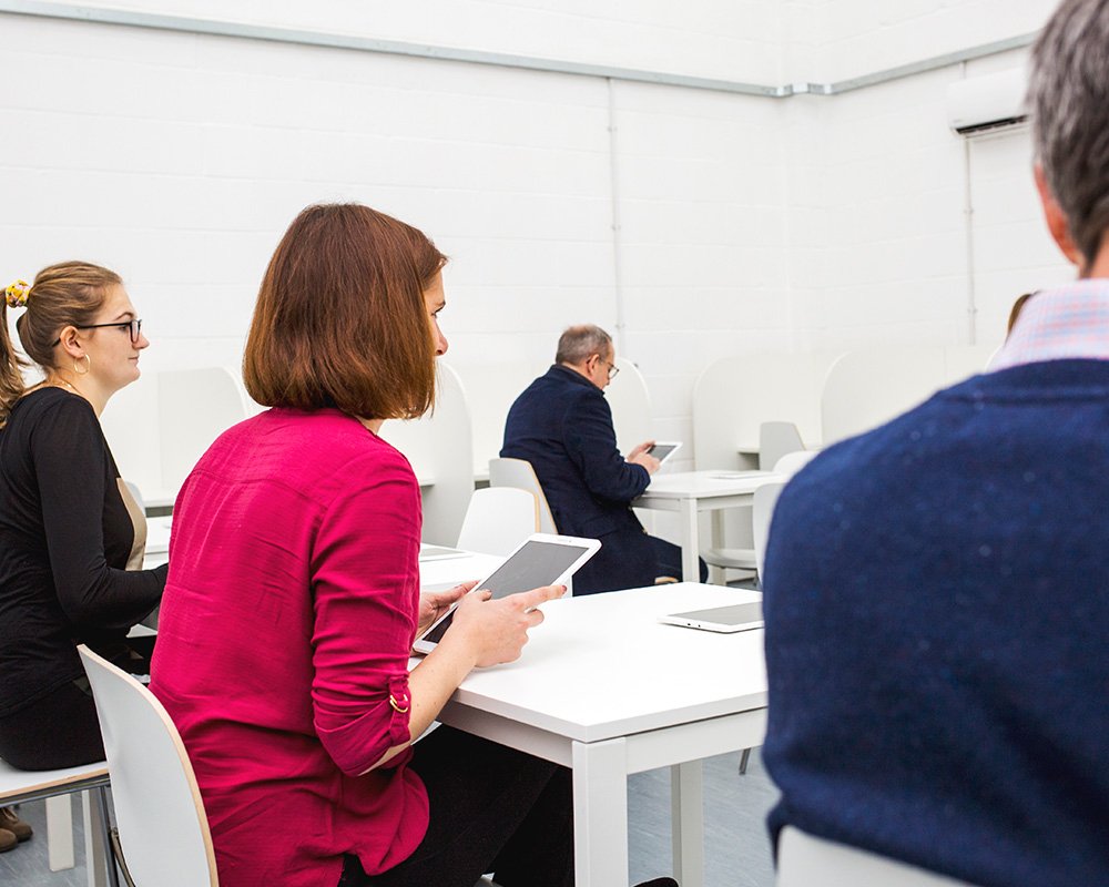 Team evaluating new food product samples and prototypes during a sensory testing and validation session.