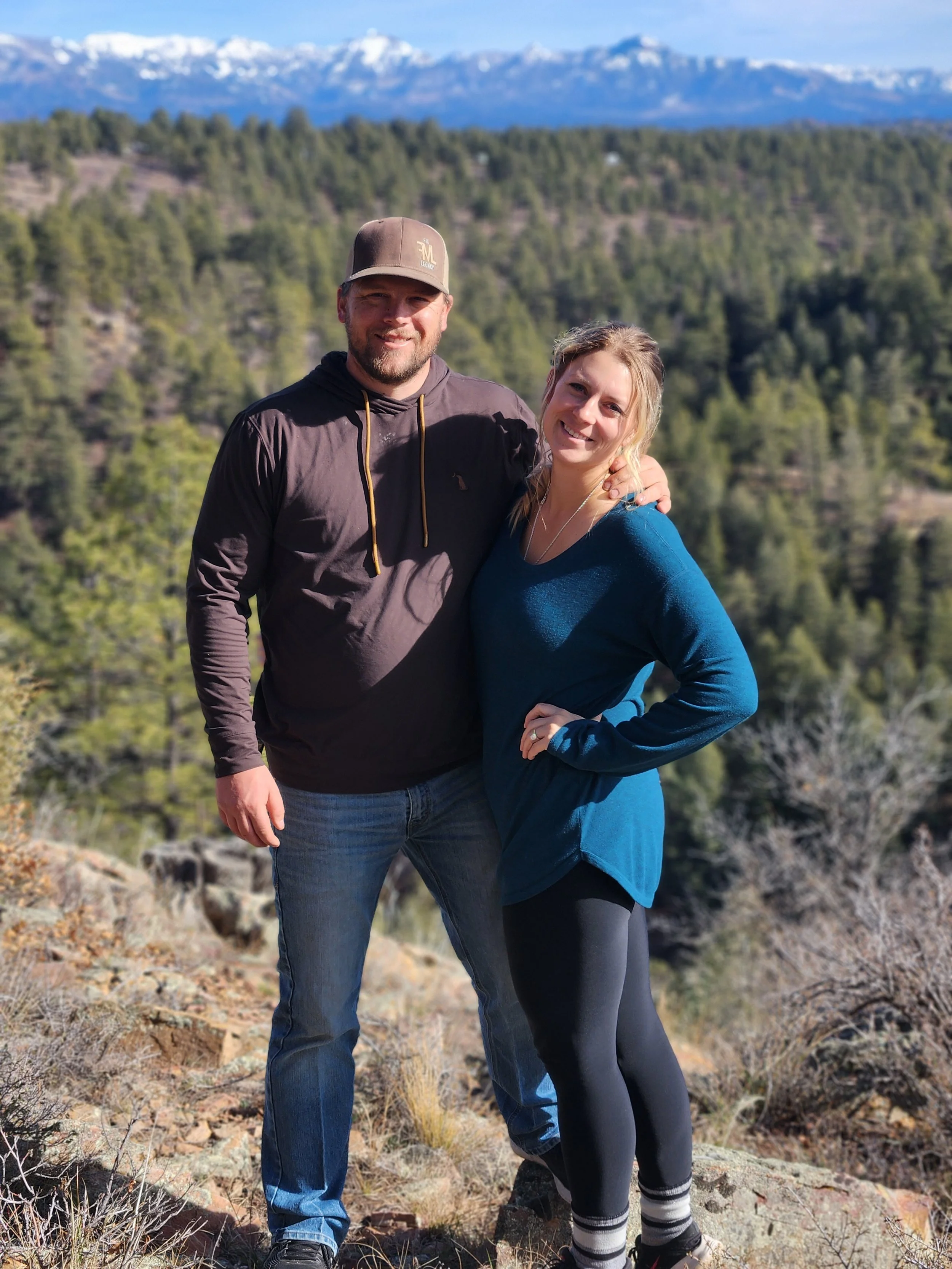 Anthony and Melissa Murray, owners of FML Aquaculture, standing in the Colorado mountains.