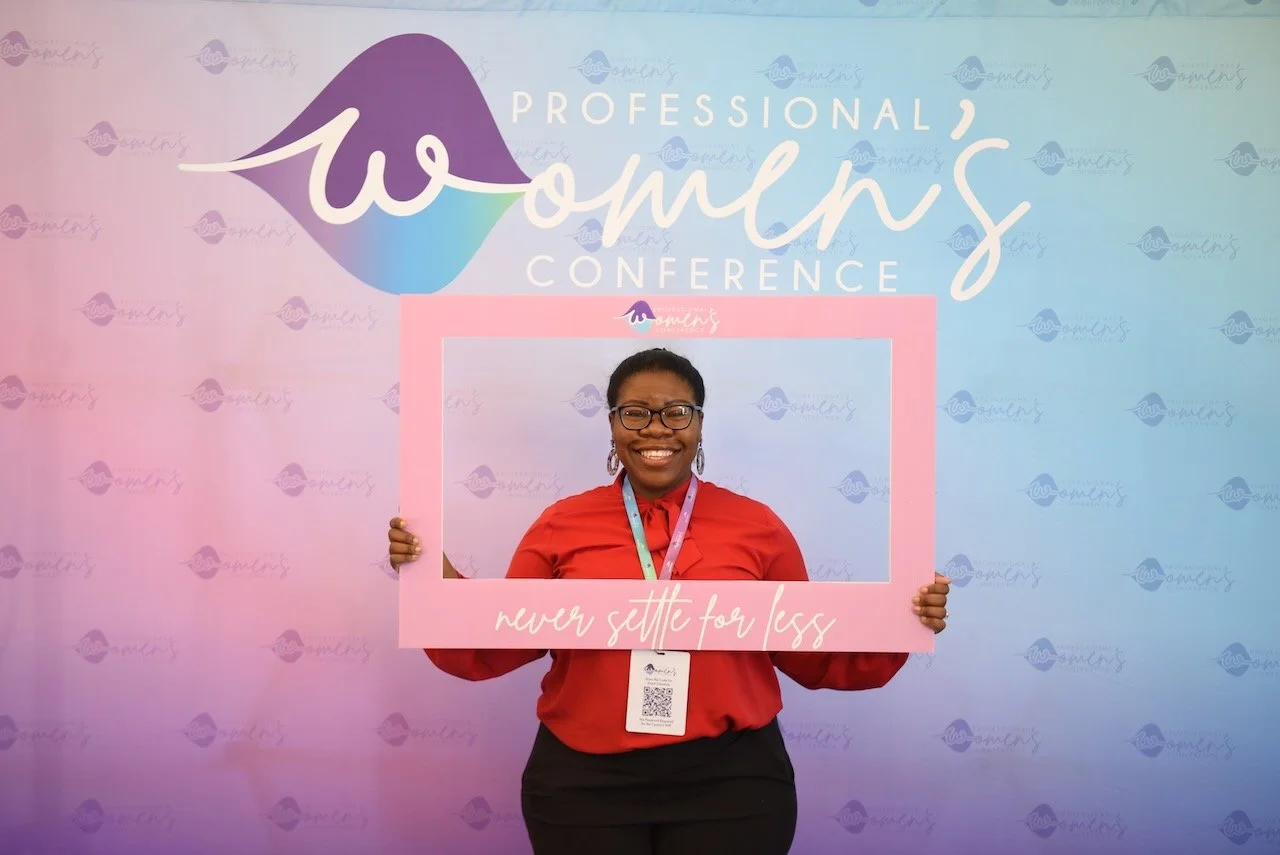 PWC attendee at conference photo wall