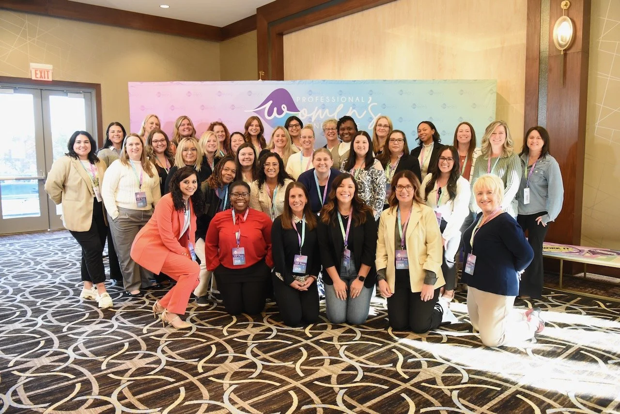 A diverse group of women attending the Professional Women's Conference