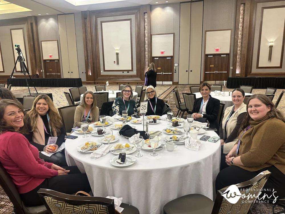 Professional women networking at the conference