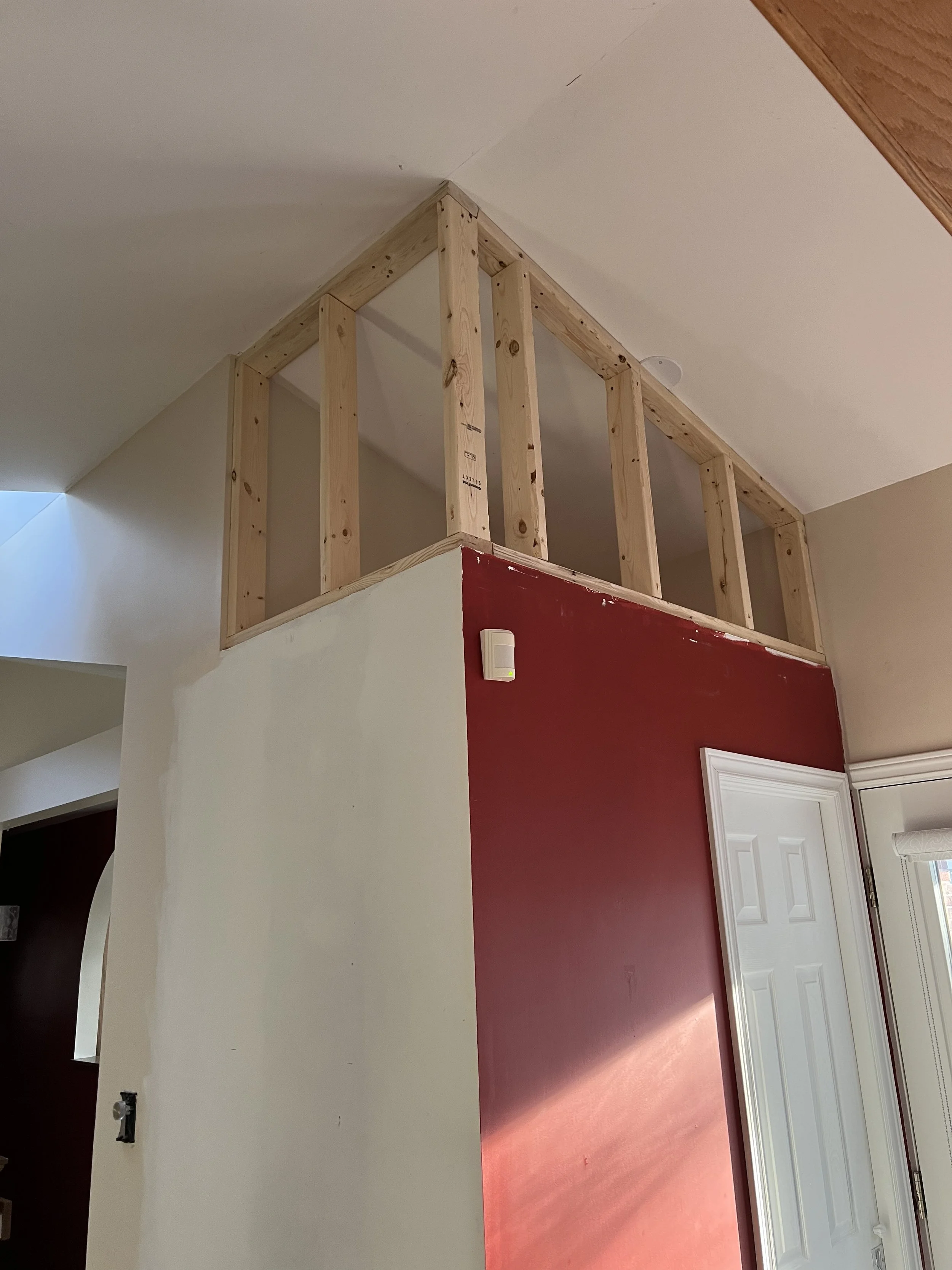 Picture of powder room being framed in during the renovation of the living area in West London by Burcon Construction.