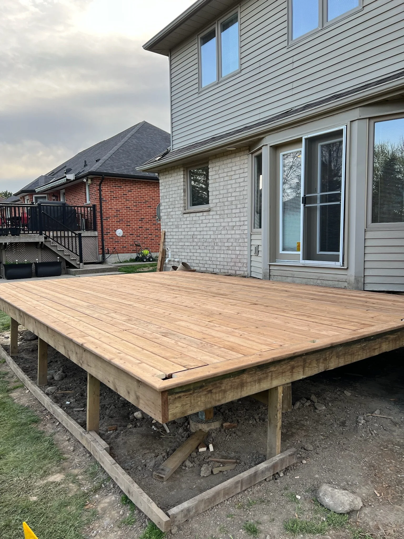 Another view of the base of deck built in Kilworth by Burcon Construction, prior to installation of railings and privacy shutter.
