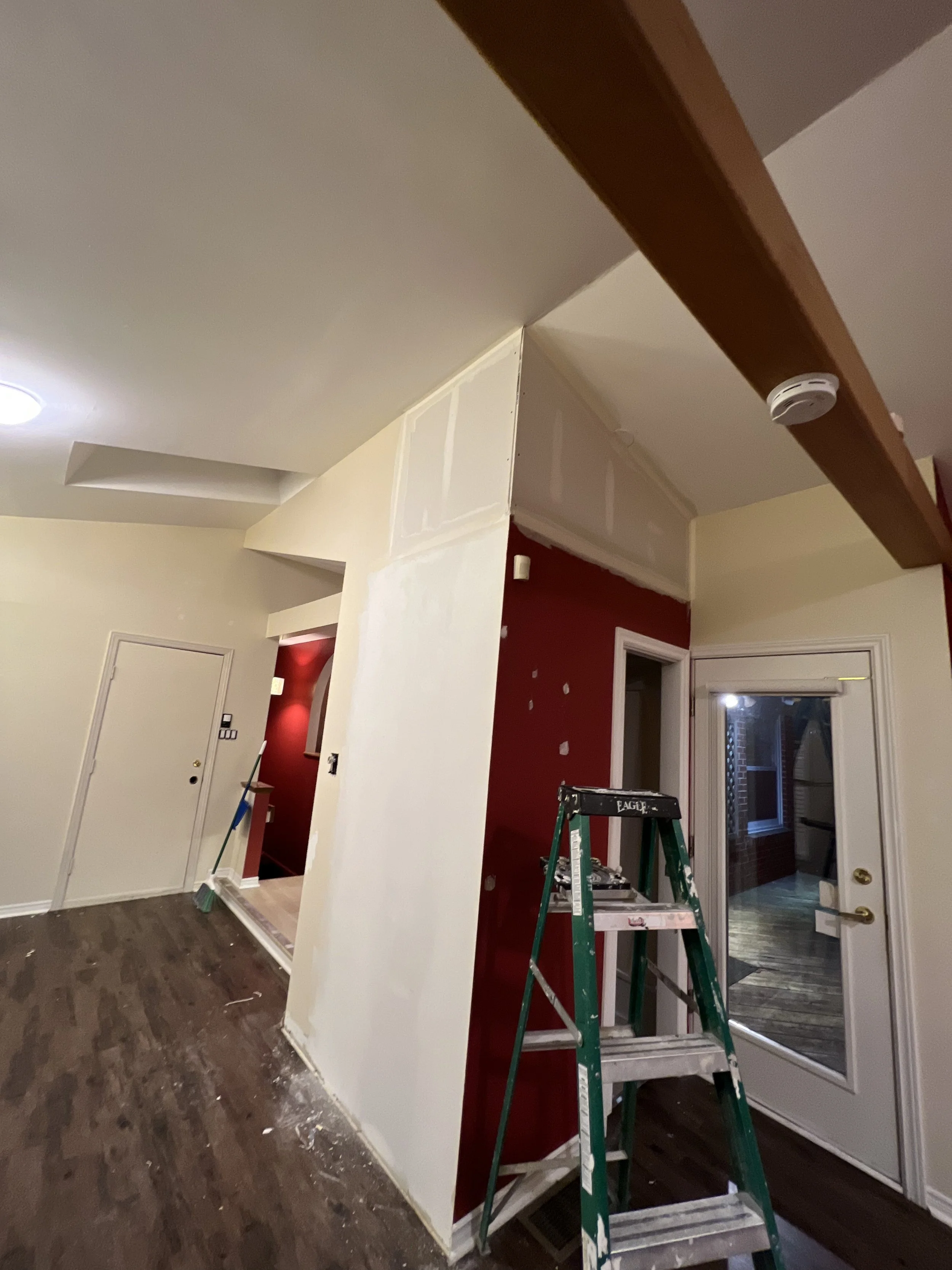Picture of powder room with ongoing drywall work during the renovation of the living area in West London by Burcon Construction.