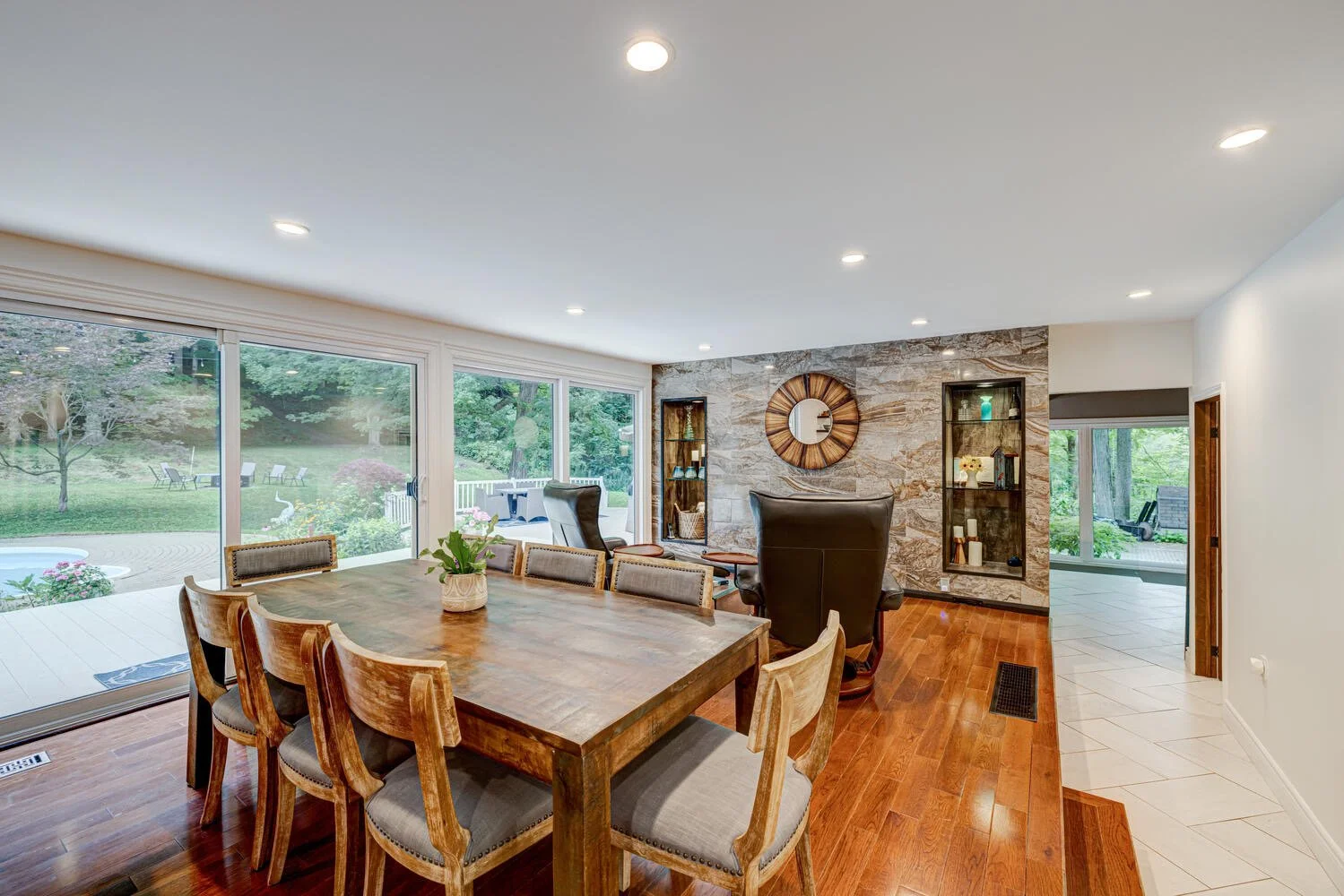 After picture of fully renovated living room, showcasing modern design and increased natural light by Burcon Construction in Komoka, Ontario.