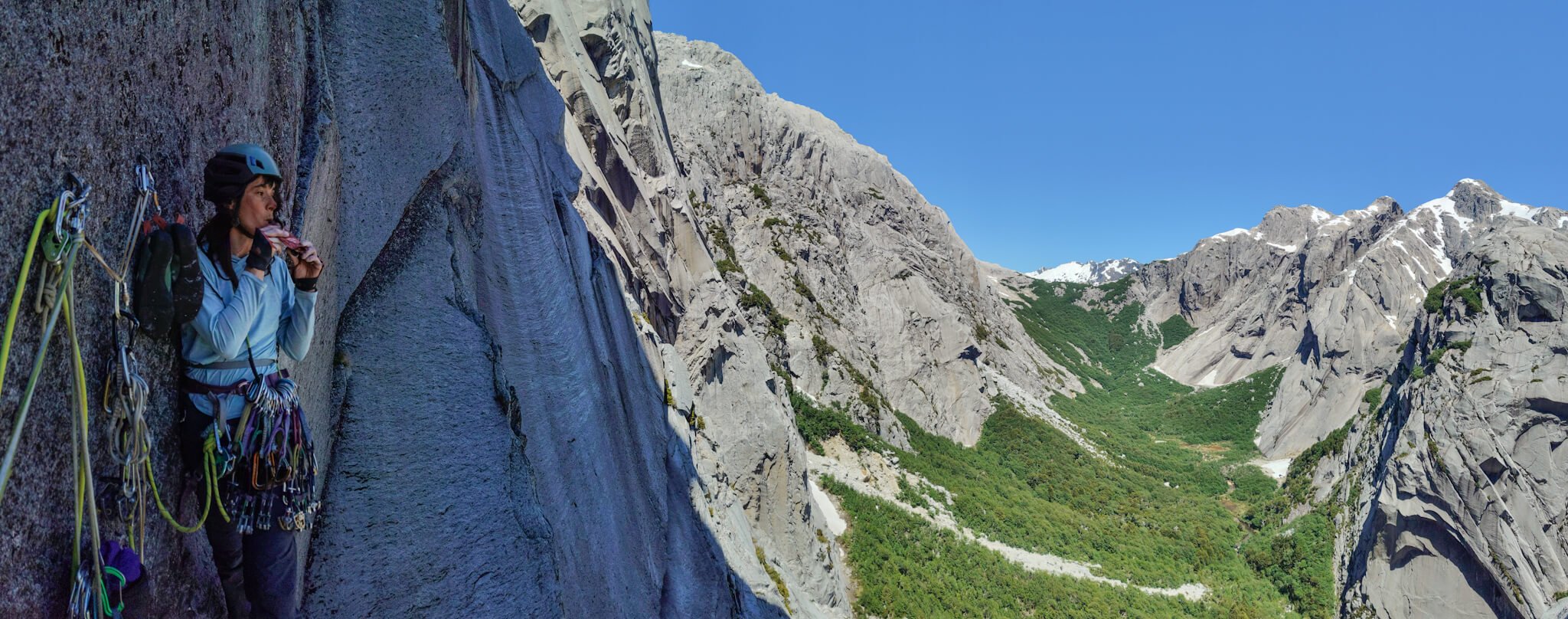 Certified climbing guide leading a multipitch route in Cochamó Valley, Chile.