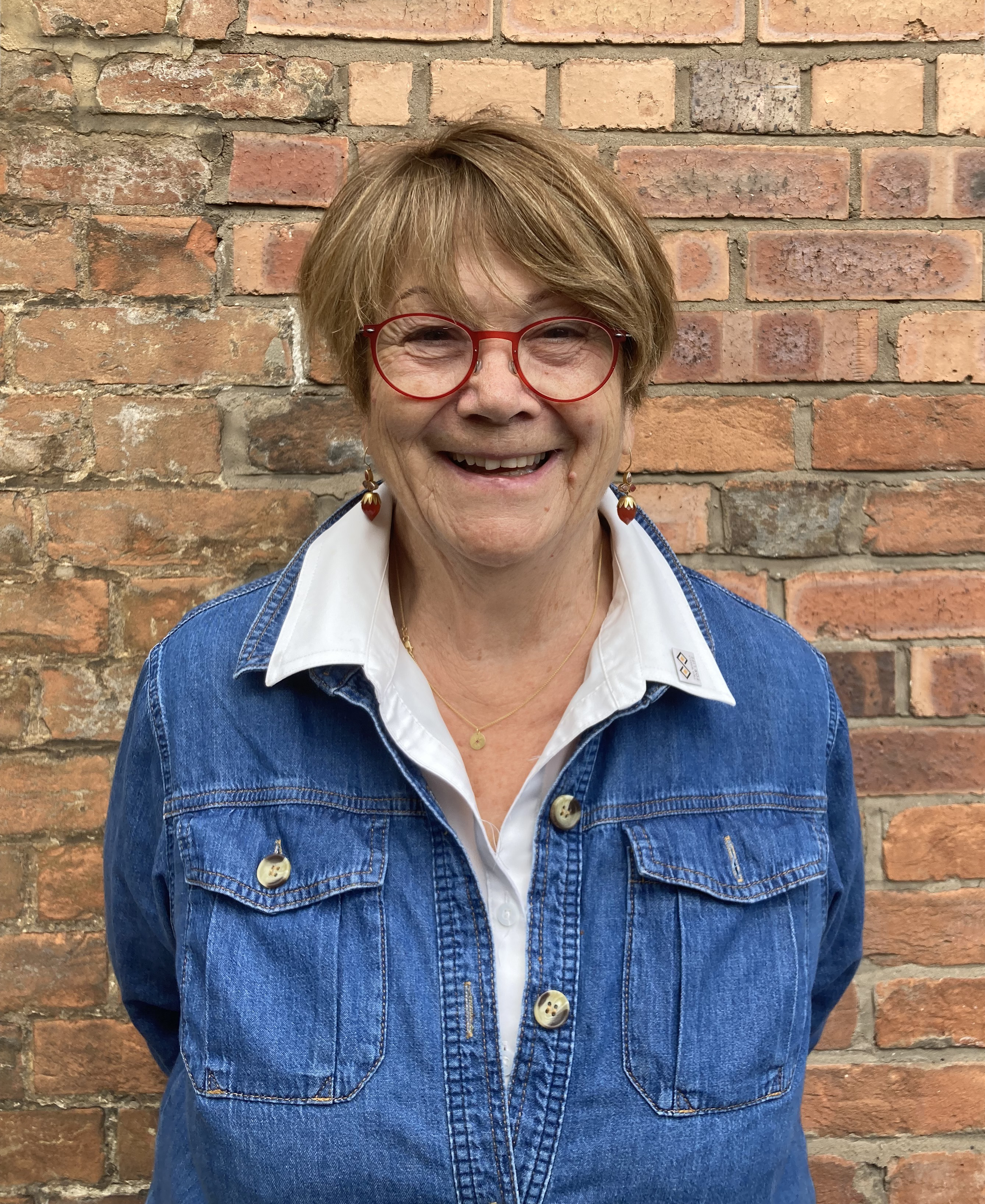 Andrea Coleman, smiling at the camera