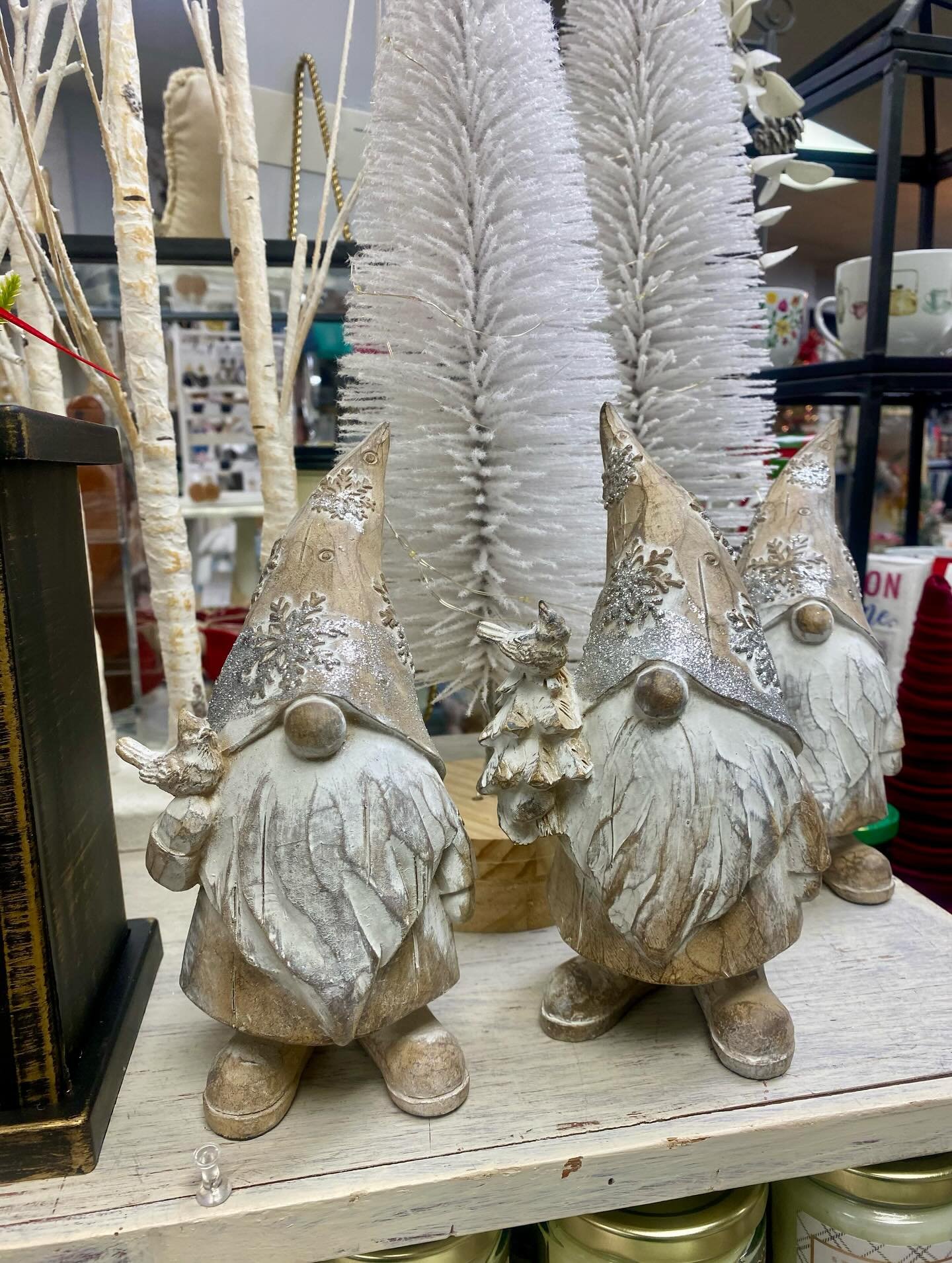 Restock of our best selling wood carved gnomes. With their neutral color they can stay out all winter long. Pair them with these white lit bottle brush trees and you have the perfect winter scene. 
#decorandmorewestwood #shoplocalma #giftideas