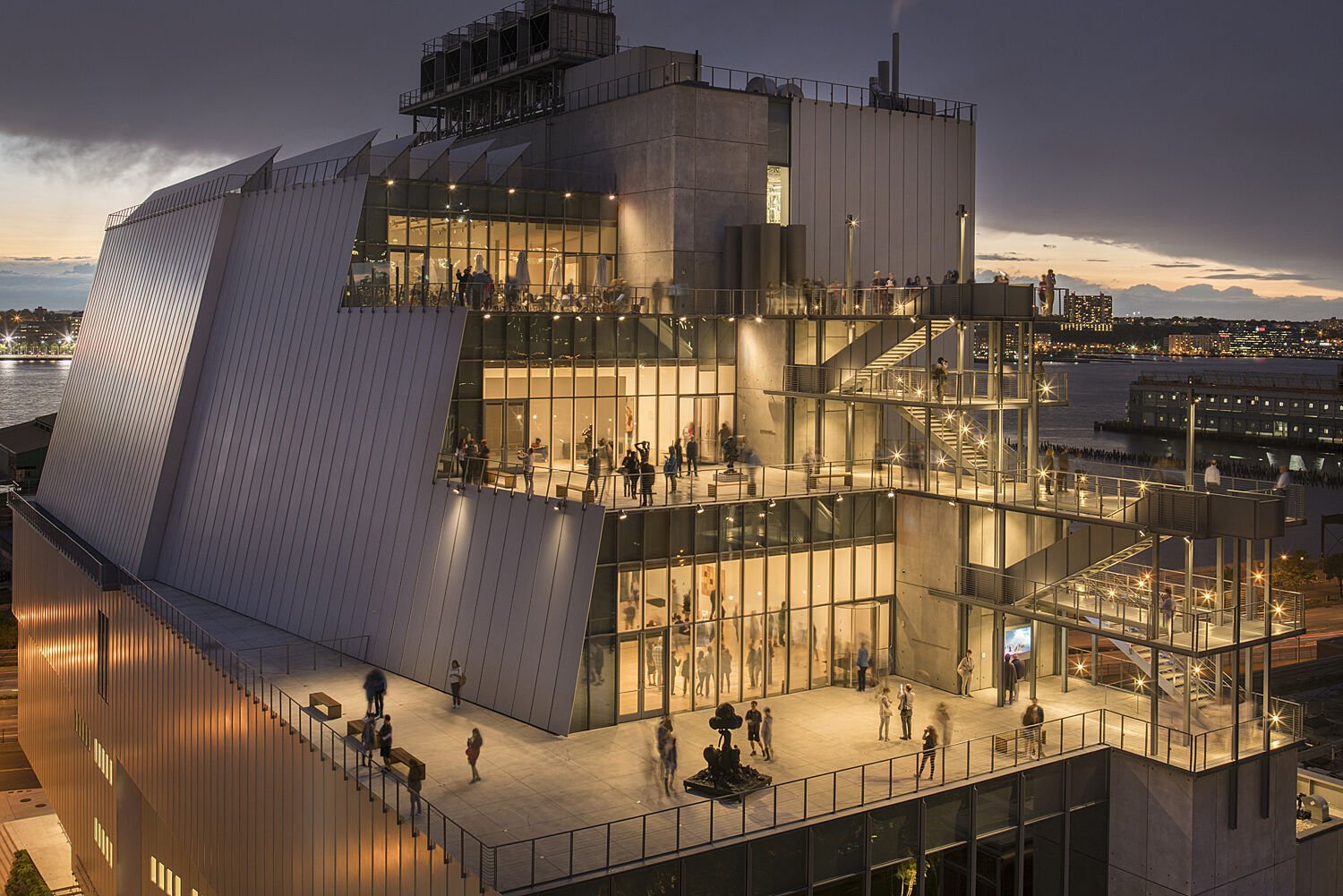 A night image of the Whitney Museum of American Art