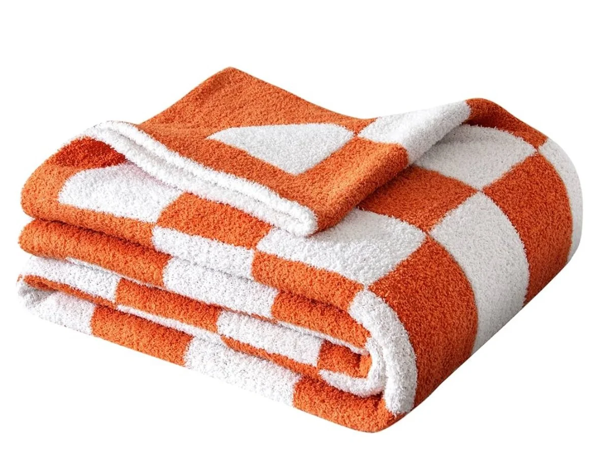 Checkerboard orange white throw blanket