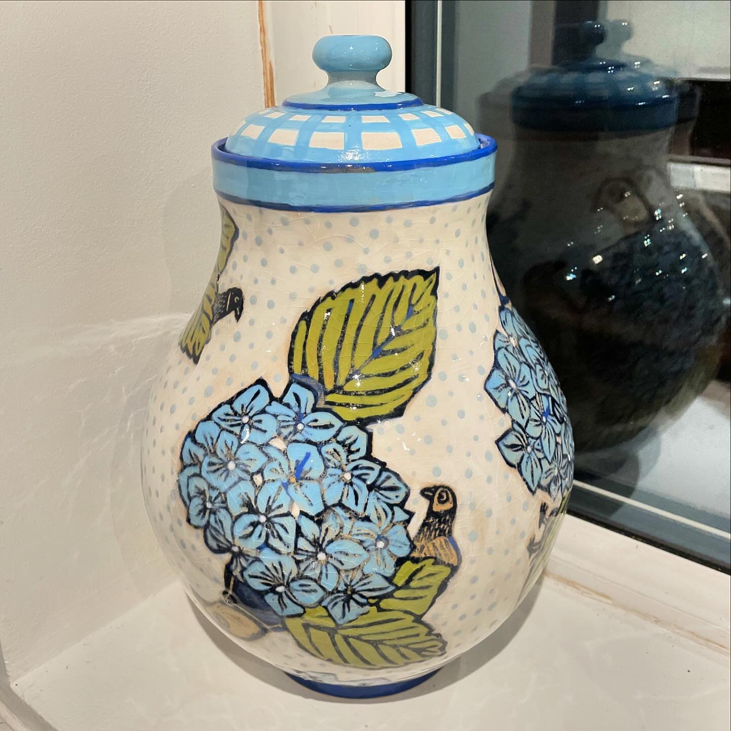 Pigeon and hydrangea jar is at home on the kitchen window sill for now. Has some glaze issues so I might refire it someday. Will remake this design in the future though, with some nice white stoneware clay.