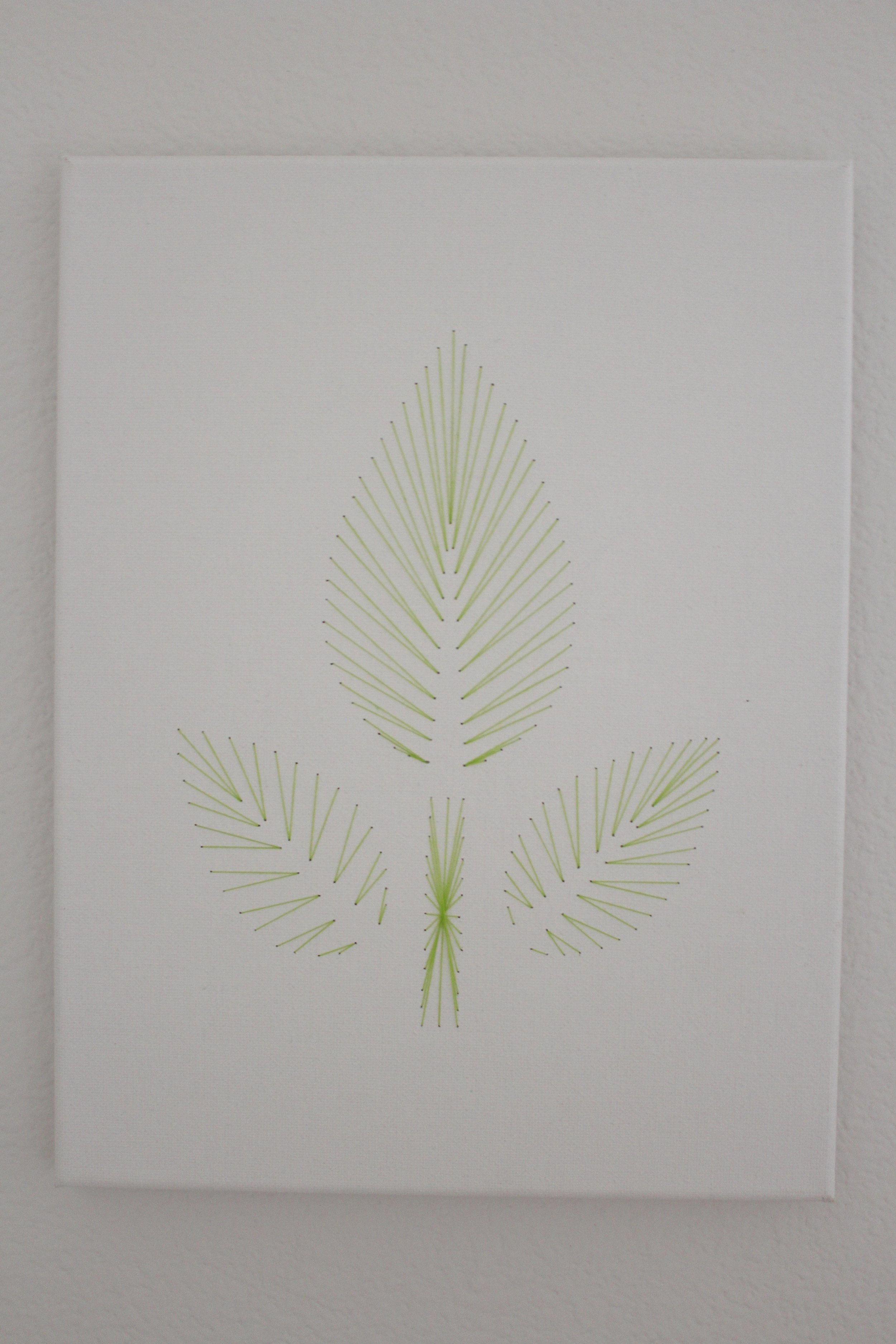 Green plant sewn into a canvas 