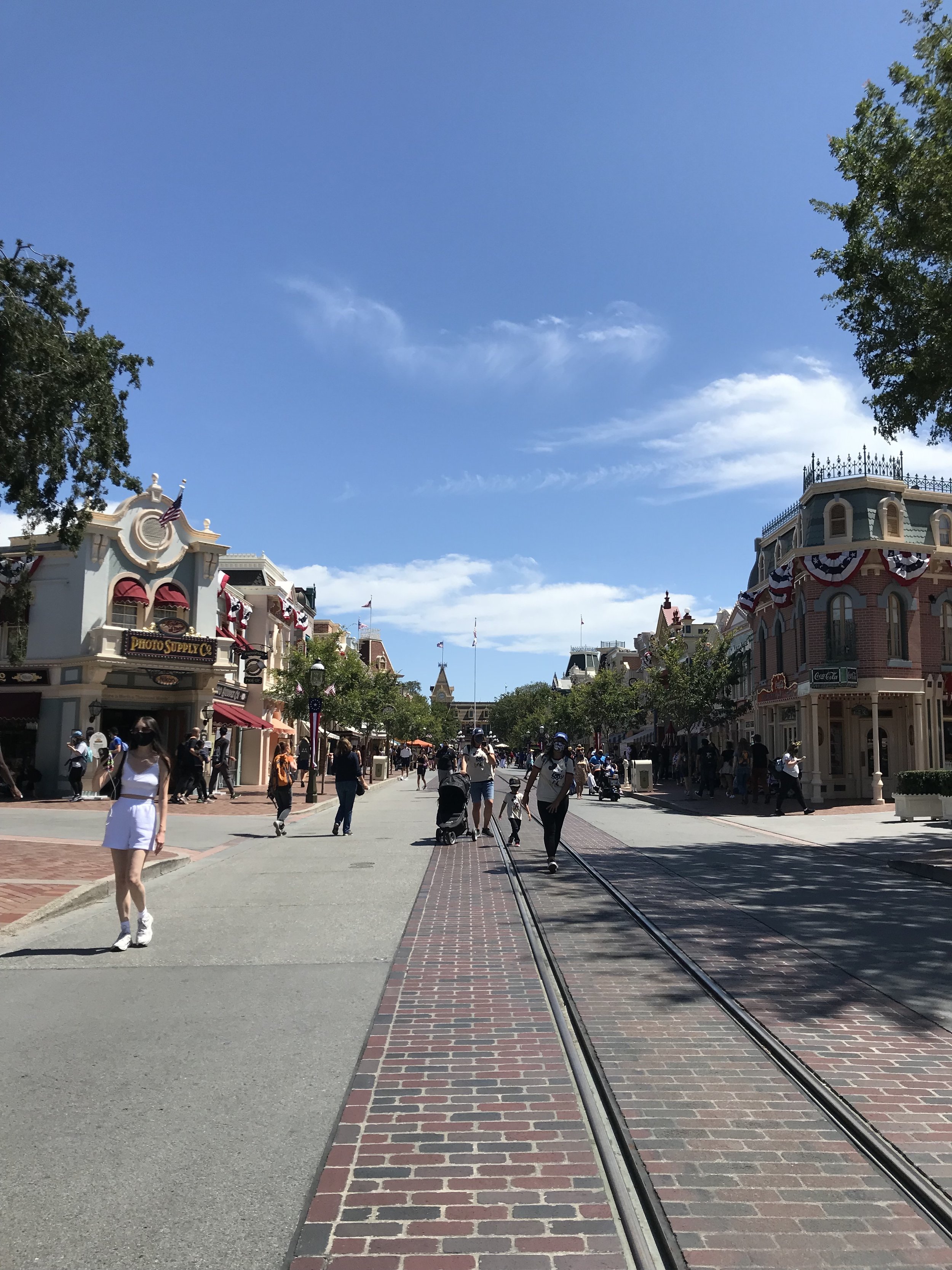  View of Main Street with people walking down the center 