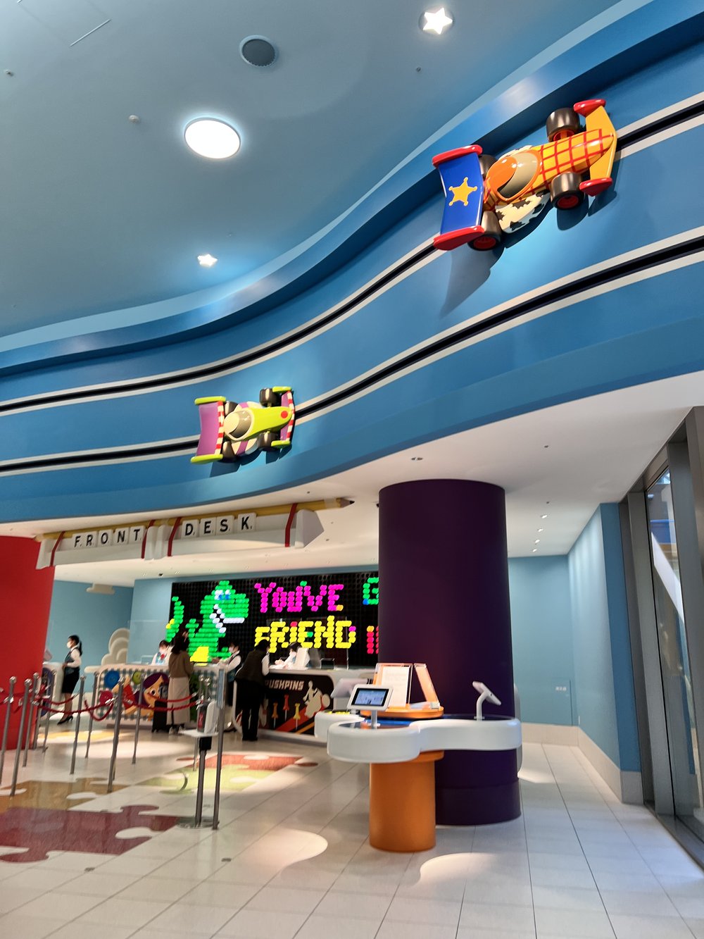 Toy race cars along the ceiling on tracks 