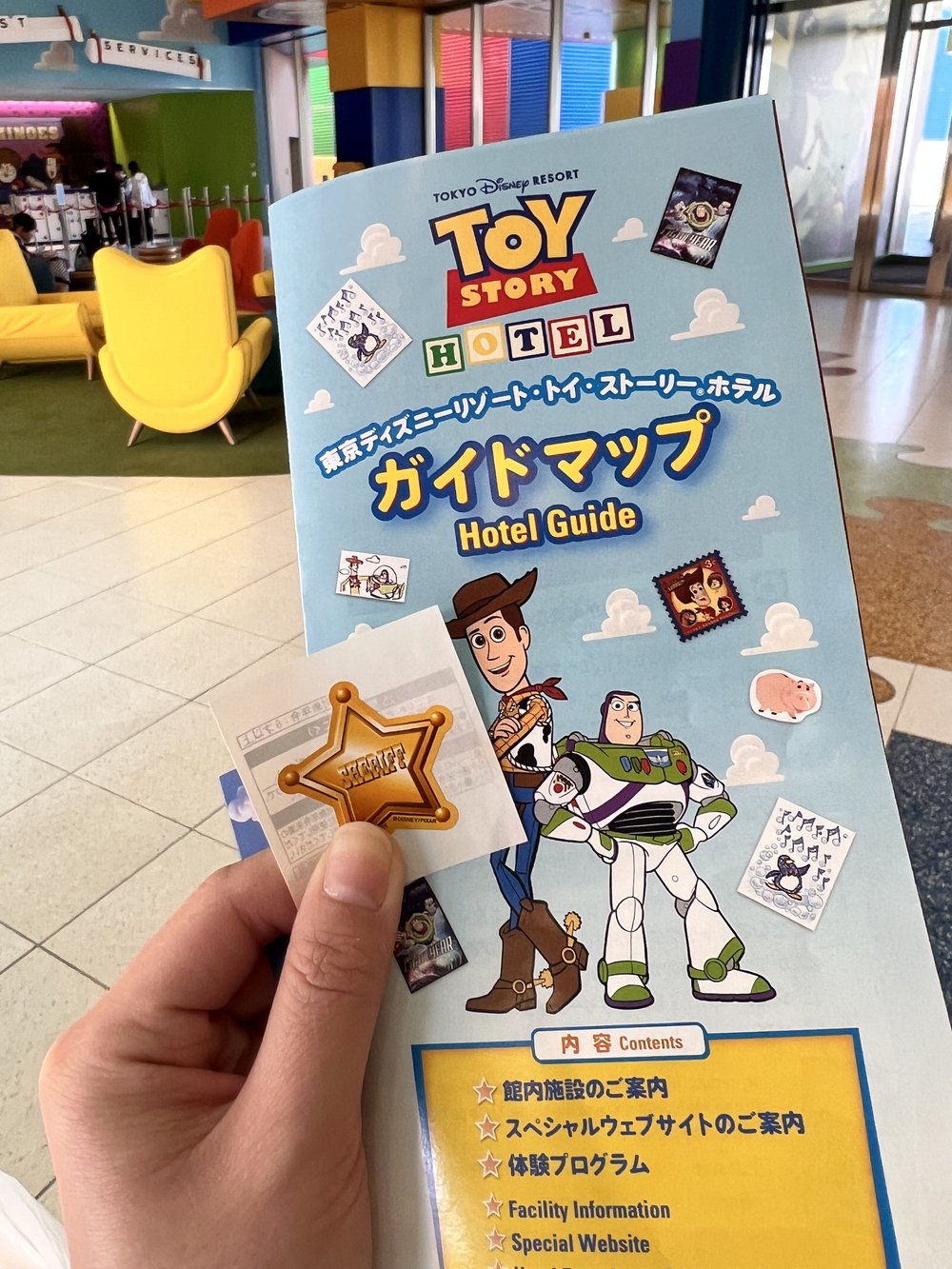  Toy Story hotel guide with a Sheriff sticker 