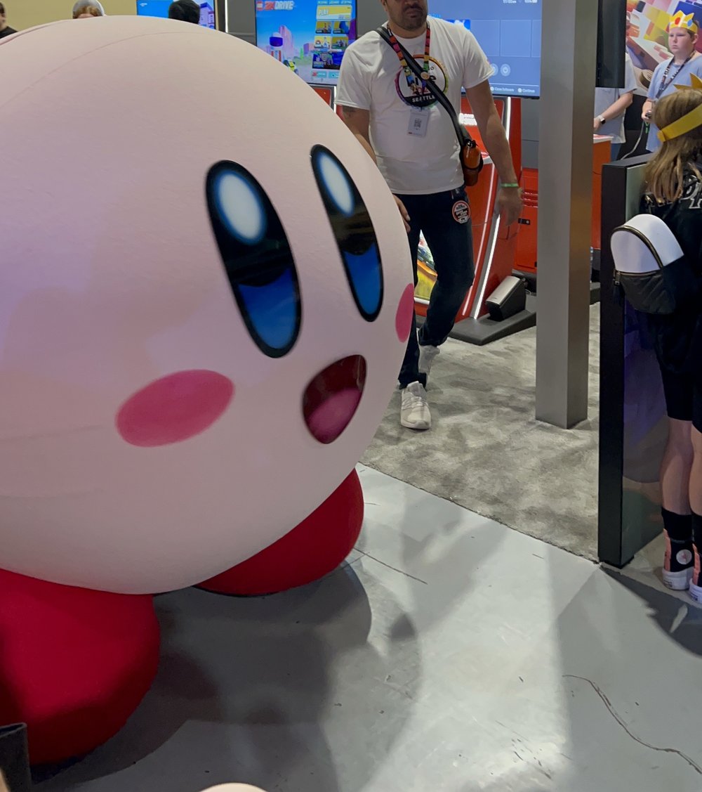 Kirby mascot walking through the conference 