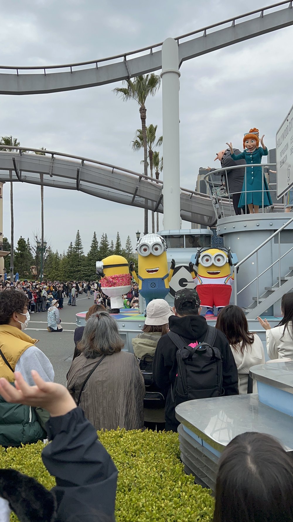  Three minion mascots on a parade float 