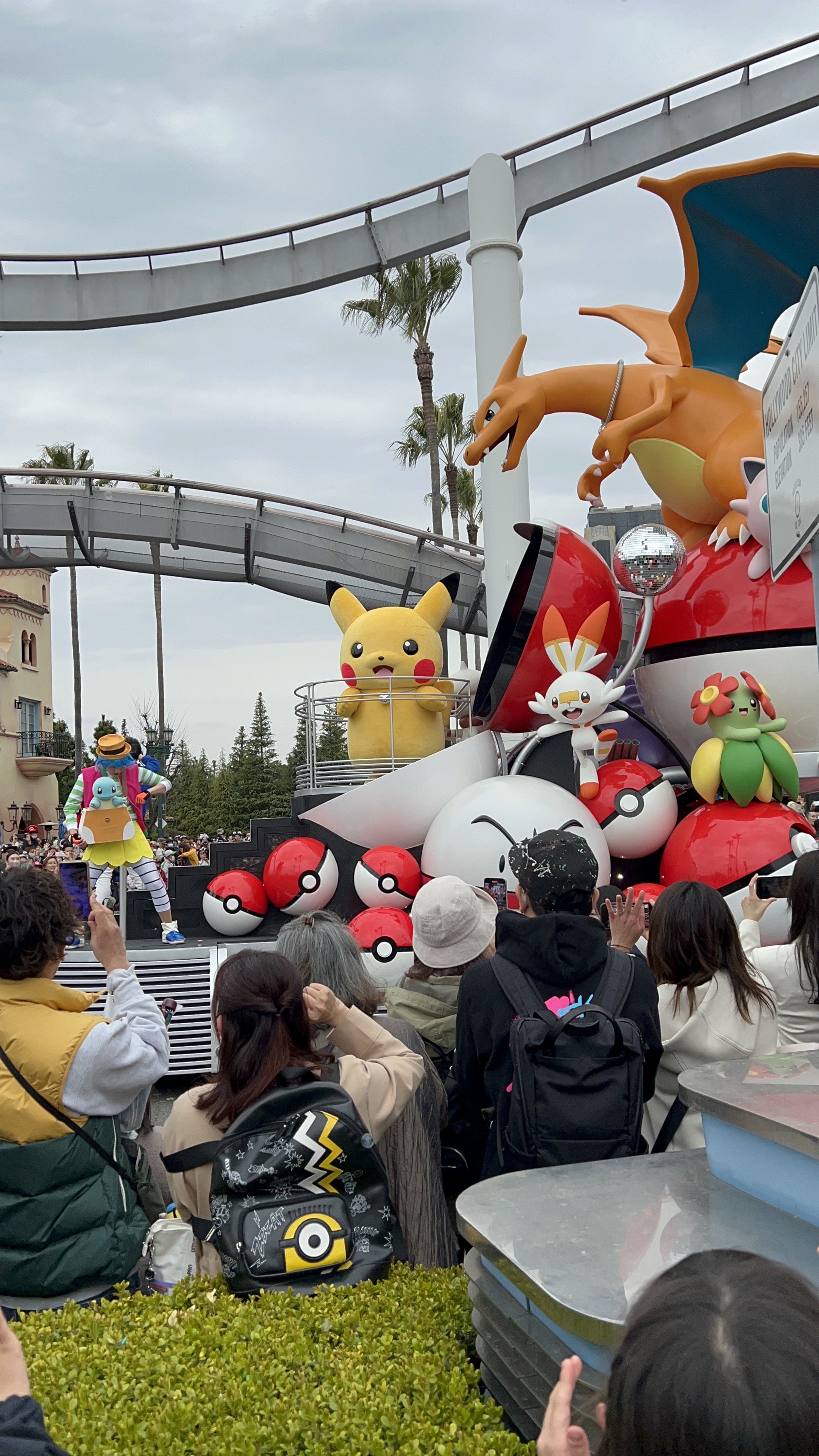  Pikachu, Charizard, and other pokemon on a Pokemon parade float 
