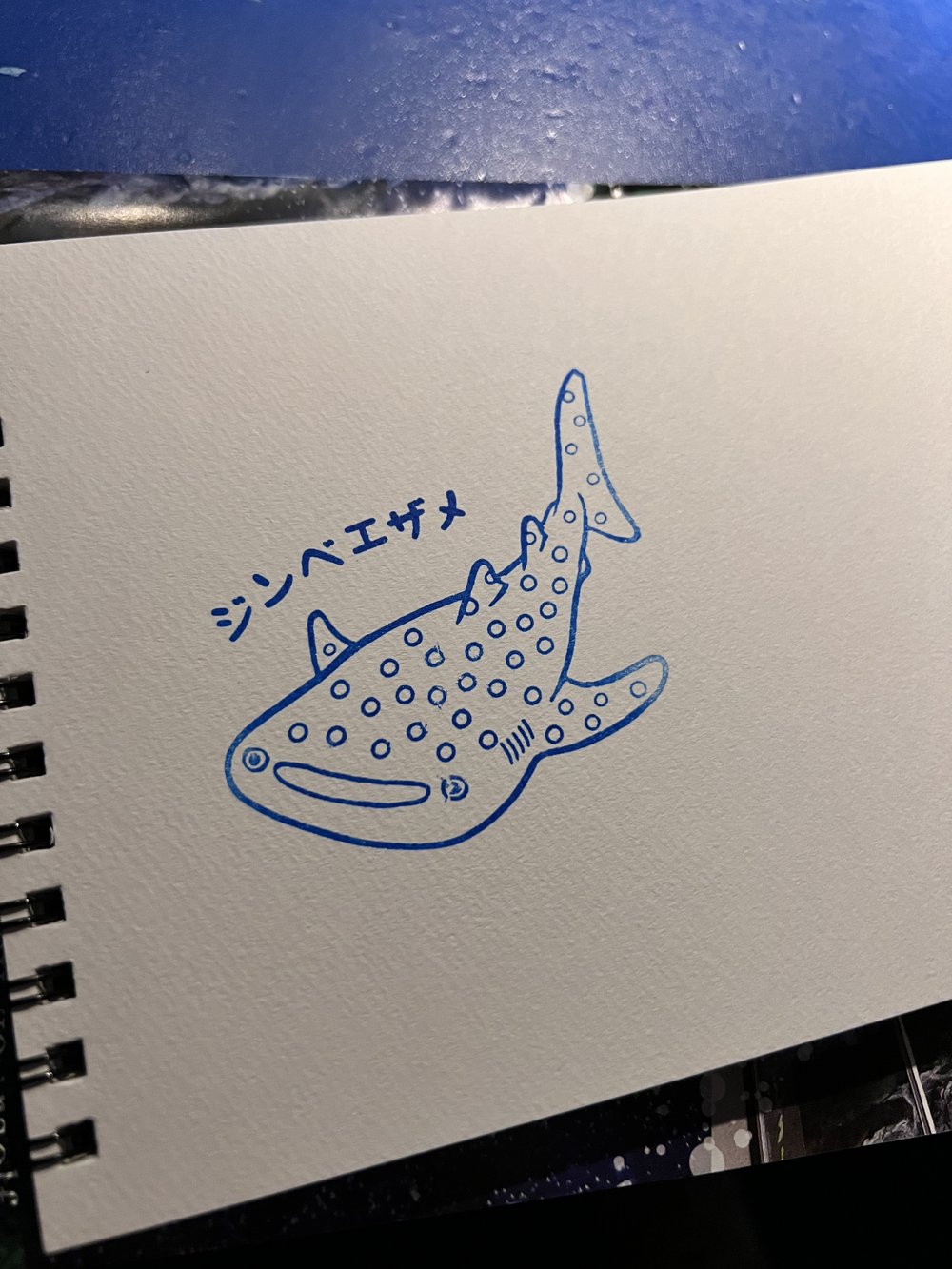  Stamp of a whale shark on a paper 