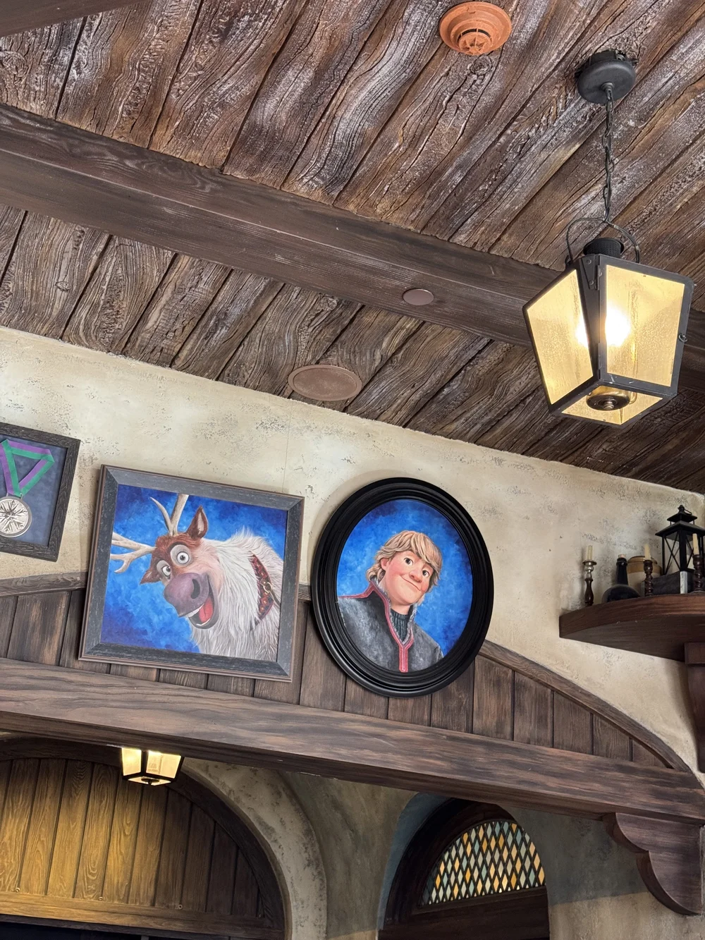  Images of Kristoff and Sven in the Frozen Ever After ride queue 