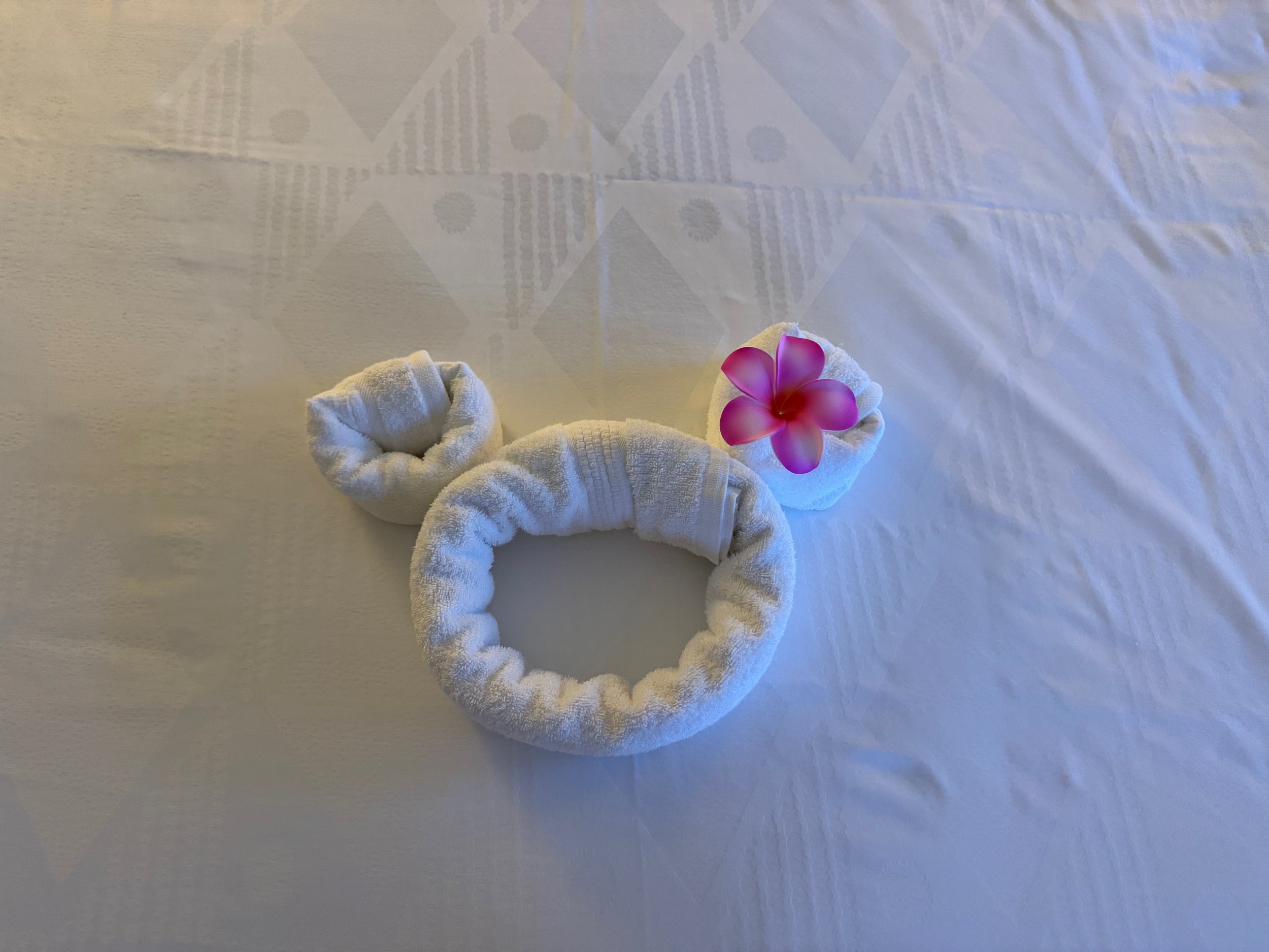  Mickey rolled towel on the bed in the Aulani deluxe studio 