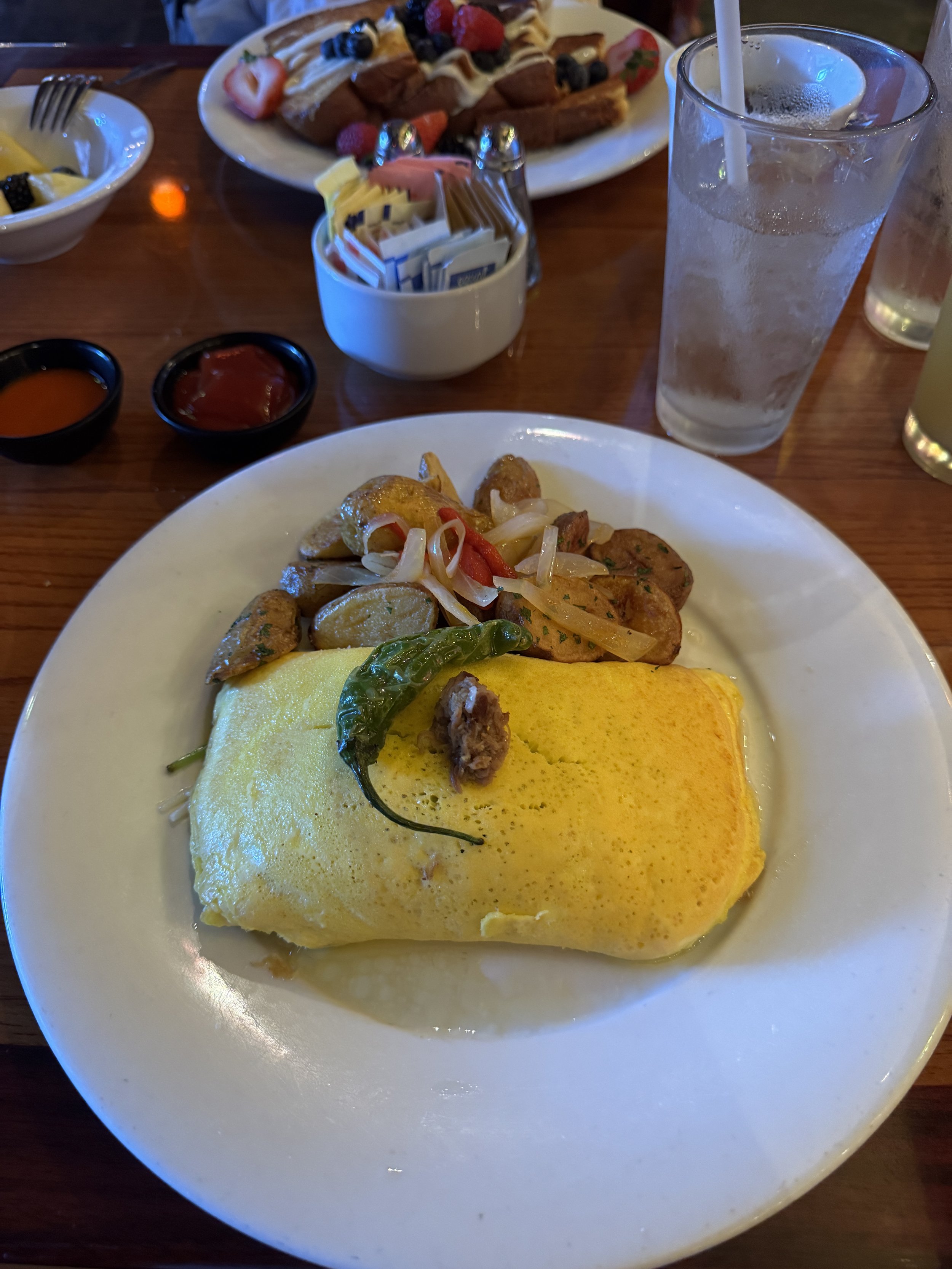  Large omelette with a side of cut potatoes   