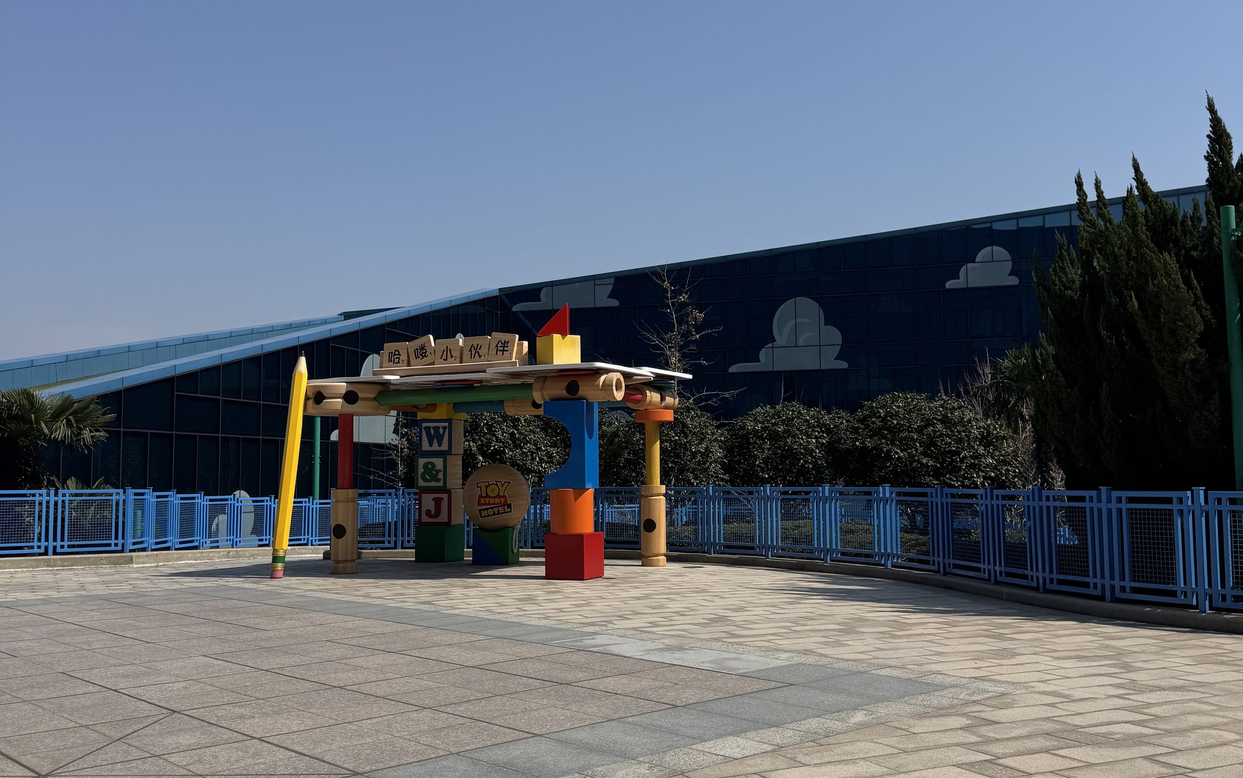 Woody and Jesse with Pixar Ball statue in Woody Courtyard