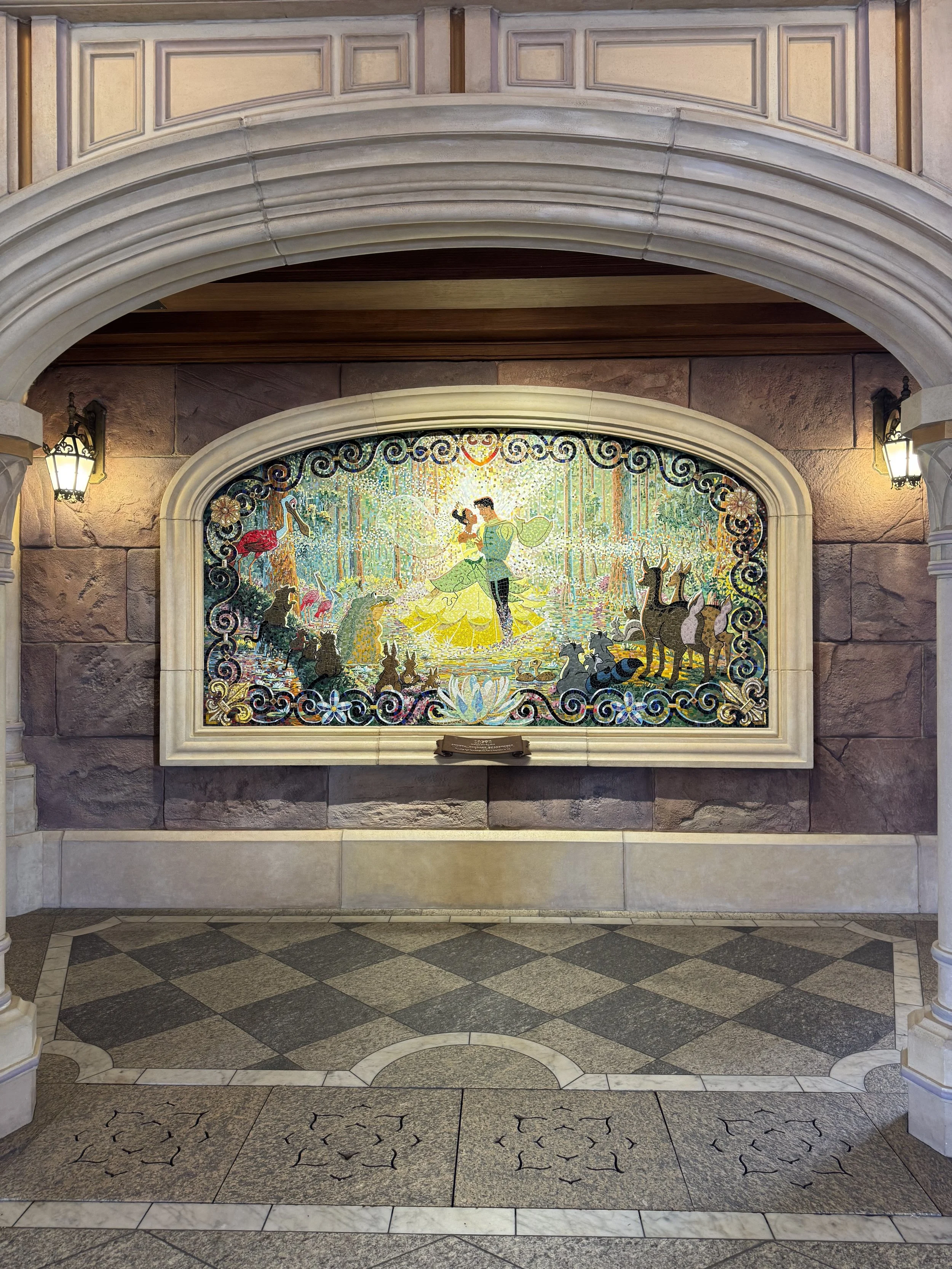  Tiana and Naveen art in the castle walkway 