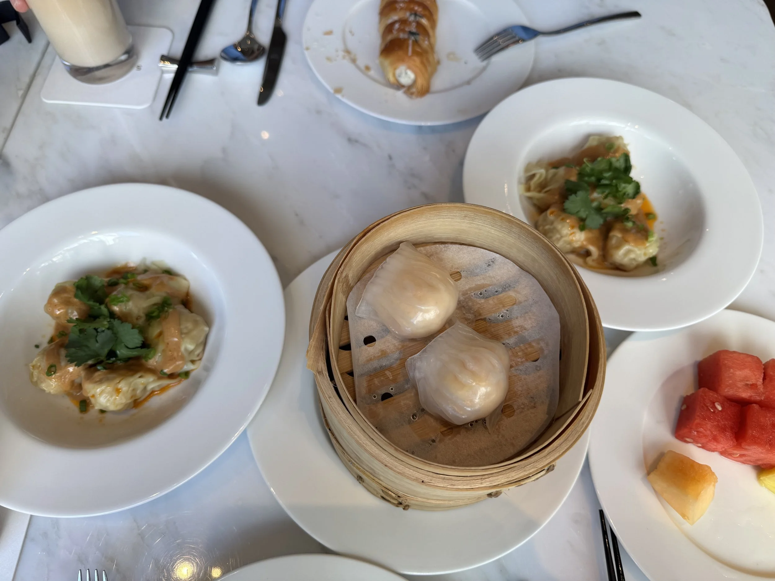  table spread of breakfast dim sum 