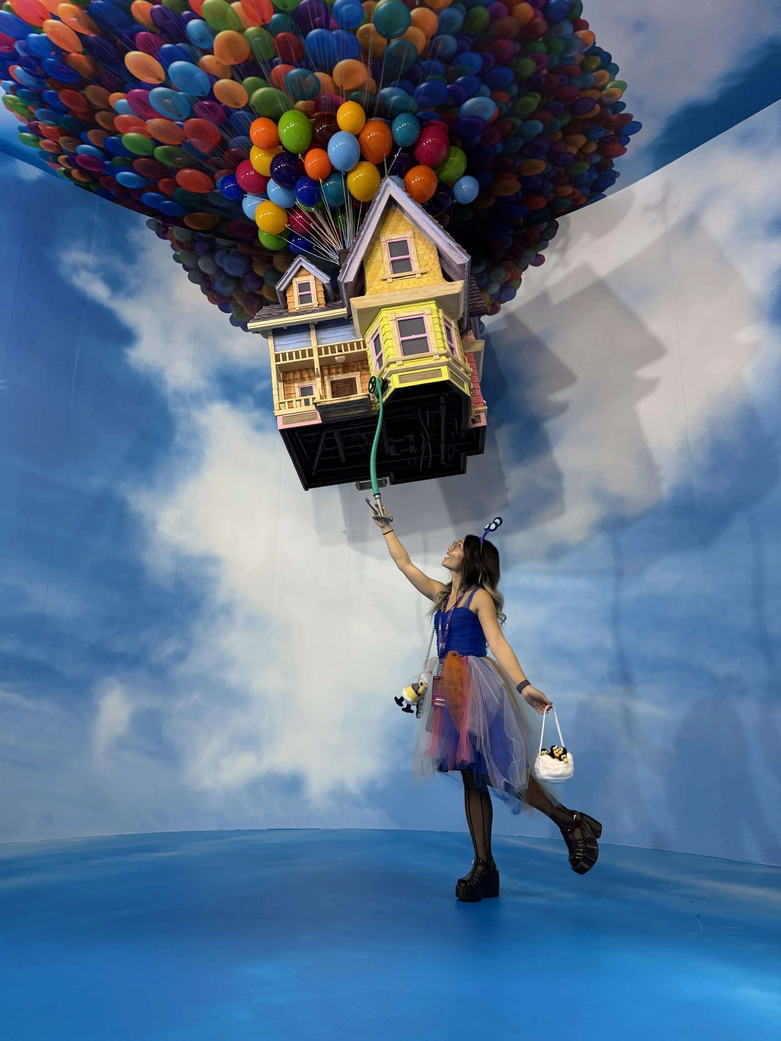  Taking a photo with the Pixar Up house photo op 