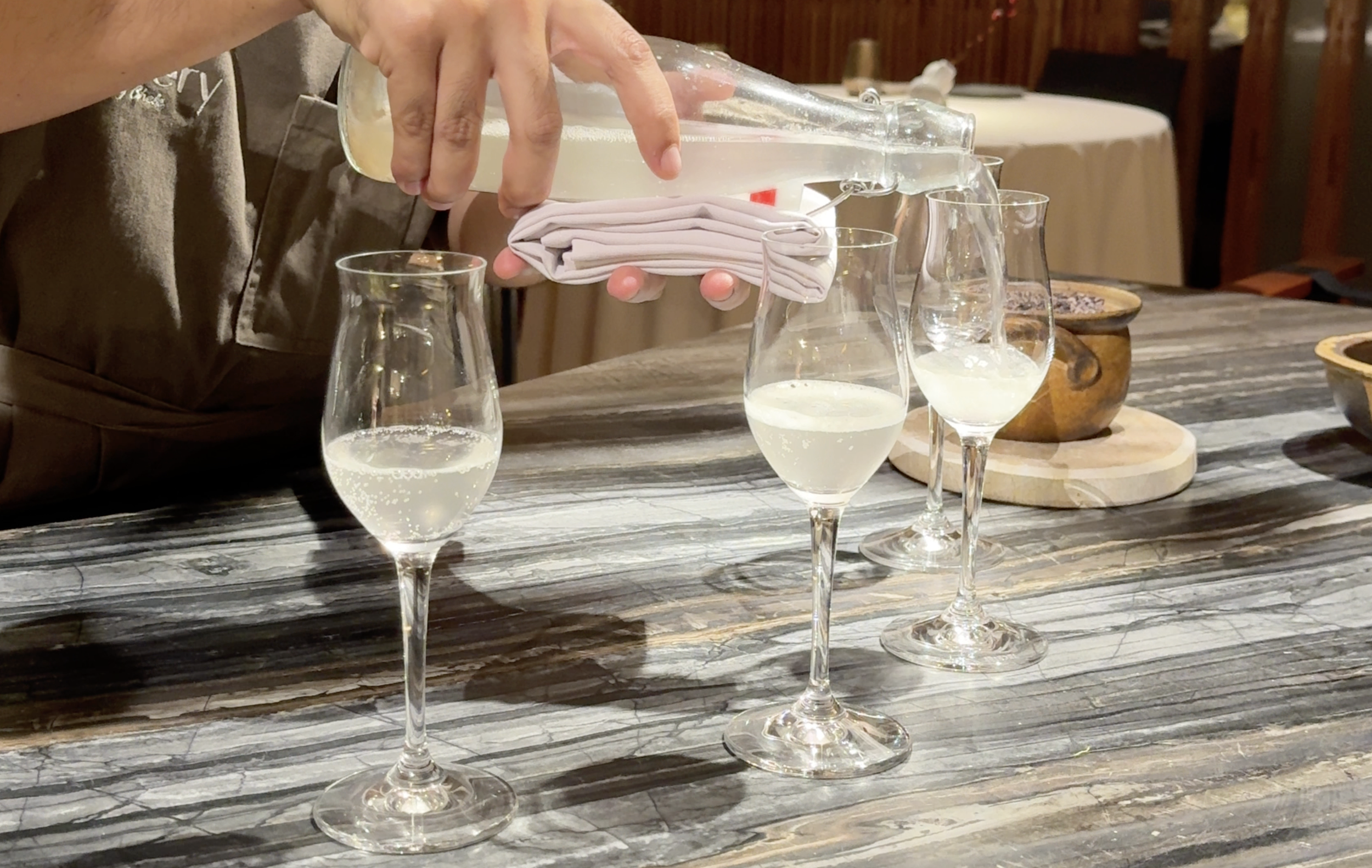 Glass flutes with white sampaguita drink