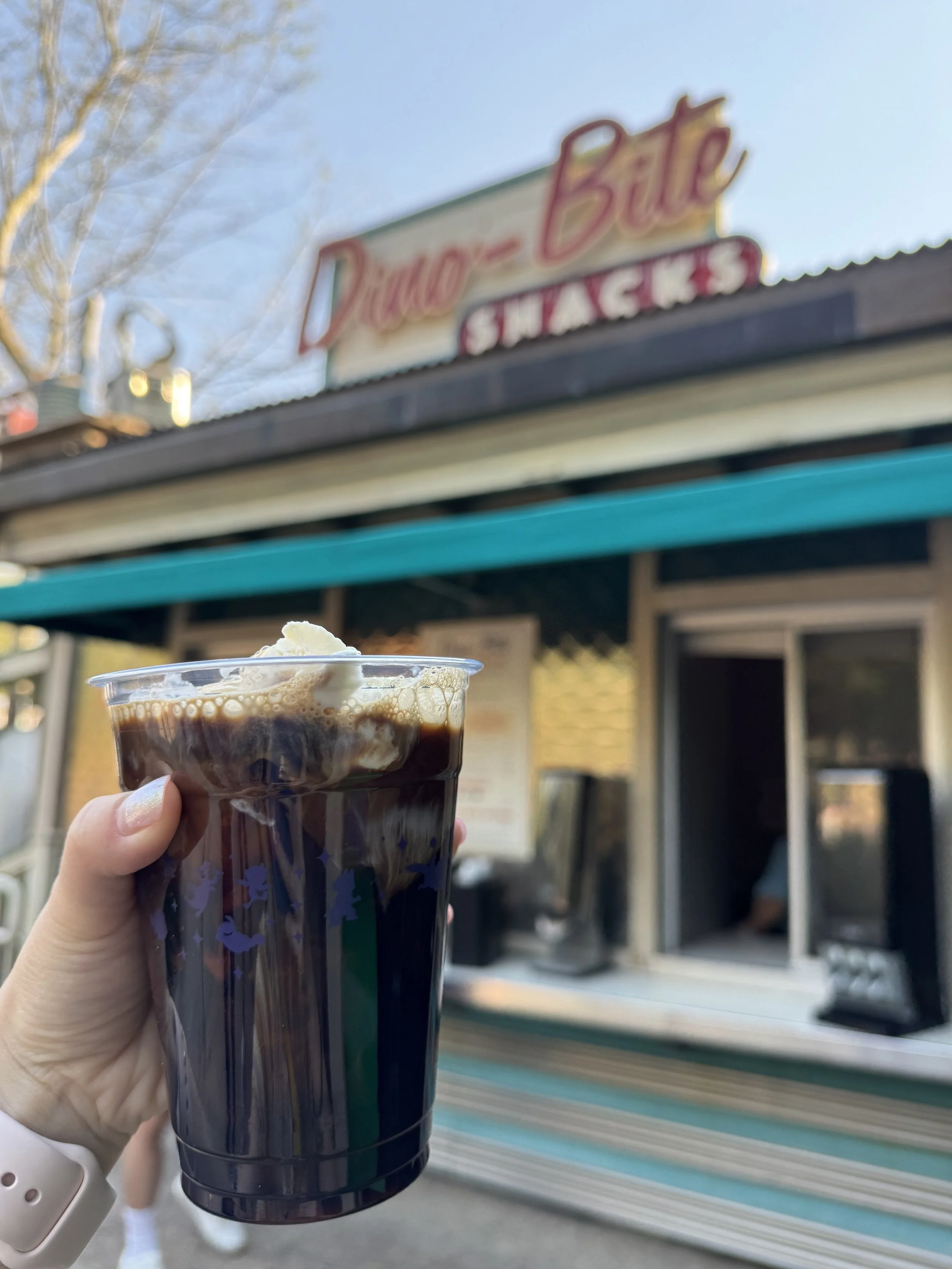 Iced coffee with ice cream in a clear plastic cup