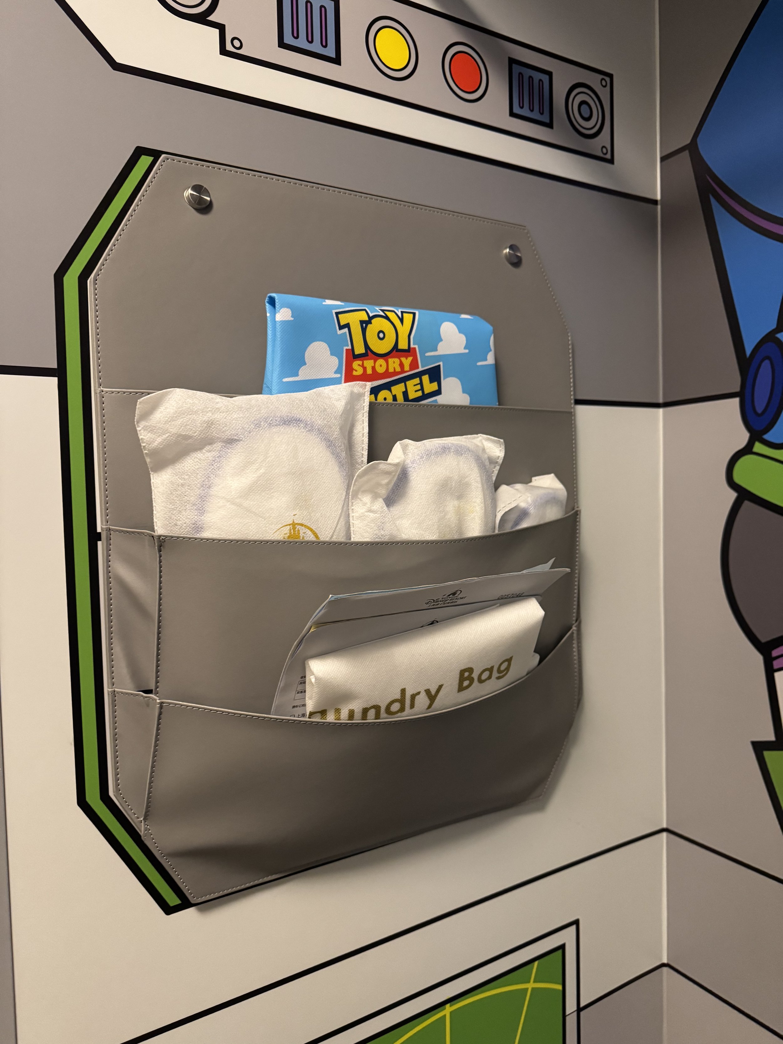 Slippers and tote bag in the Buzz Lightyear room