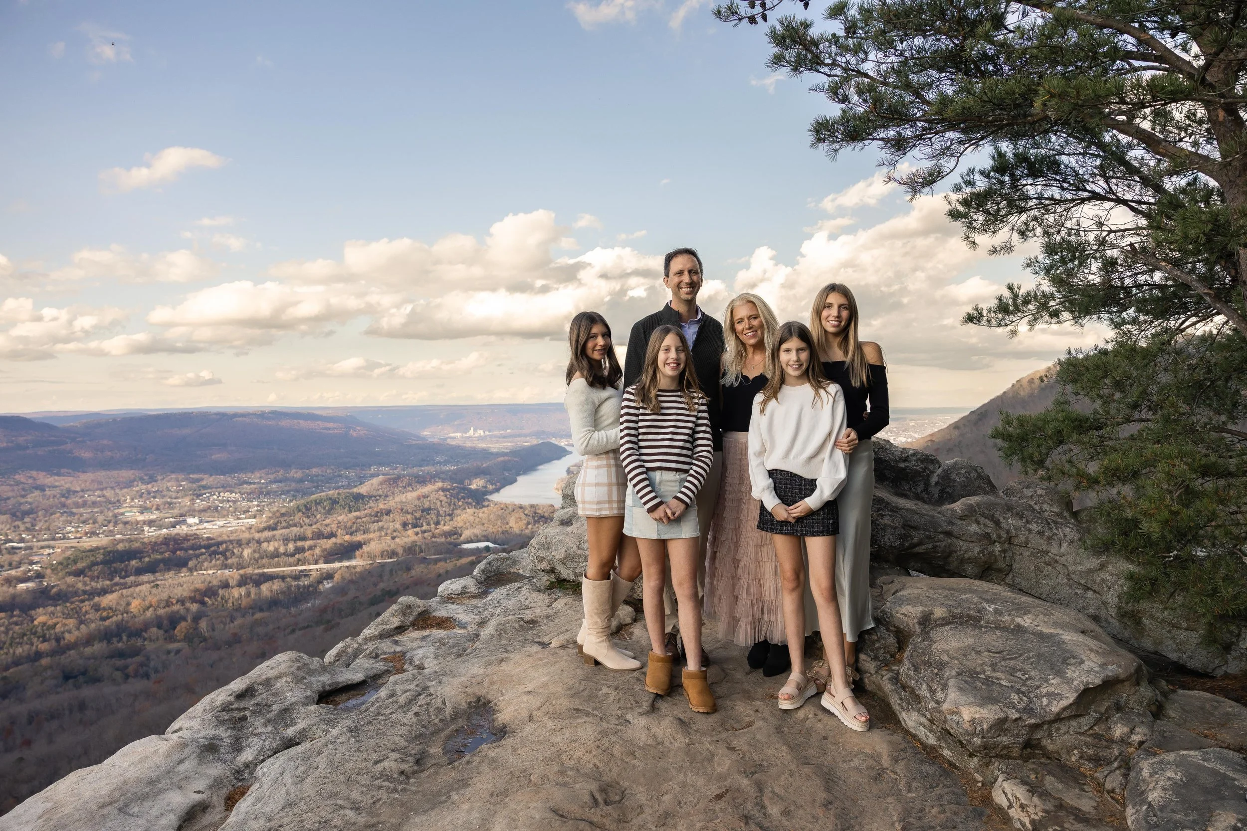 beautiful family photo on sunset rock on lookout mountain taken by Direbloom Photography