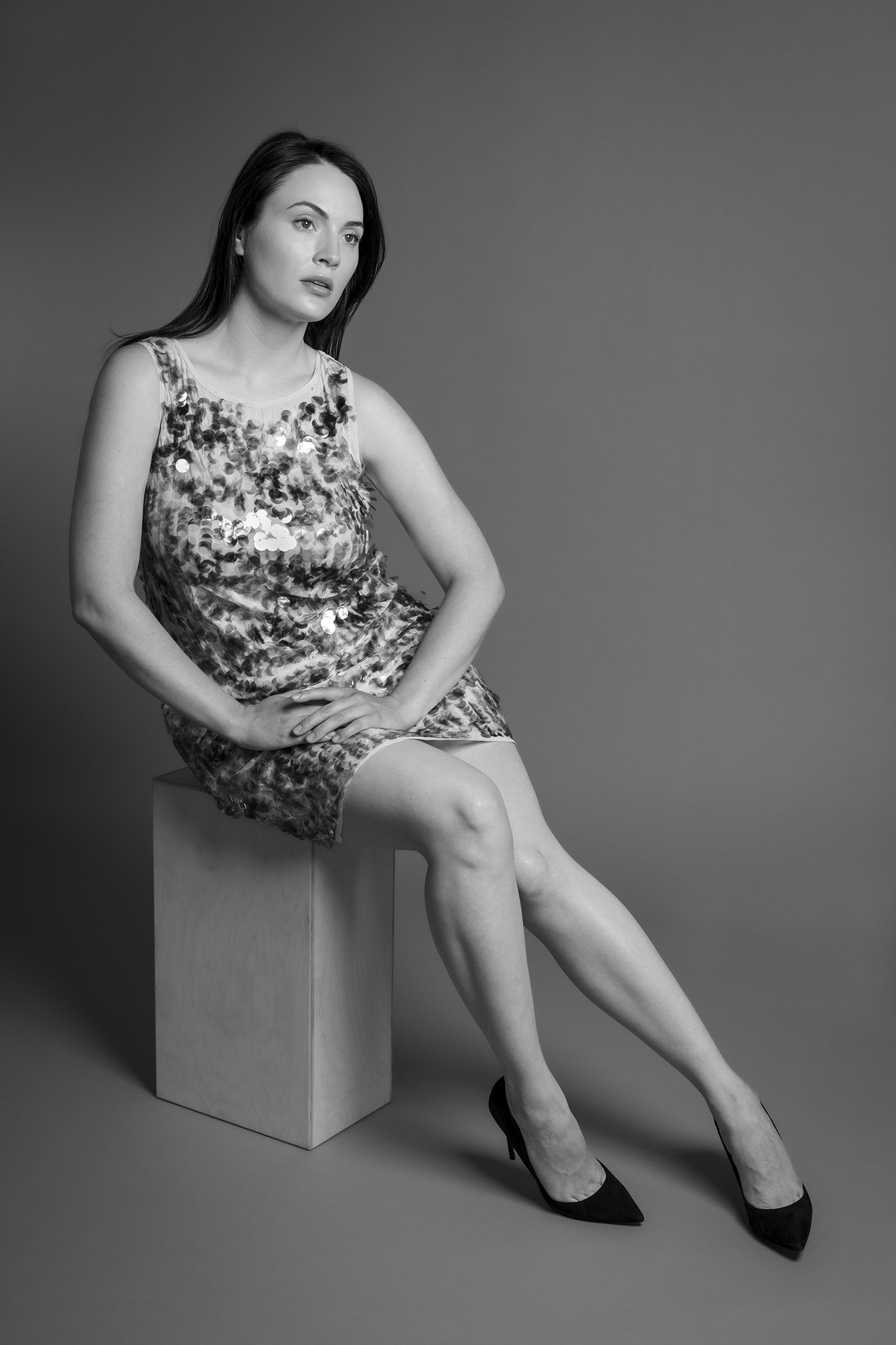 Woman in sequined dress photographed in black and white in Seattle
