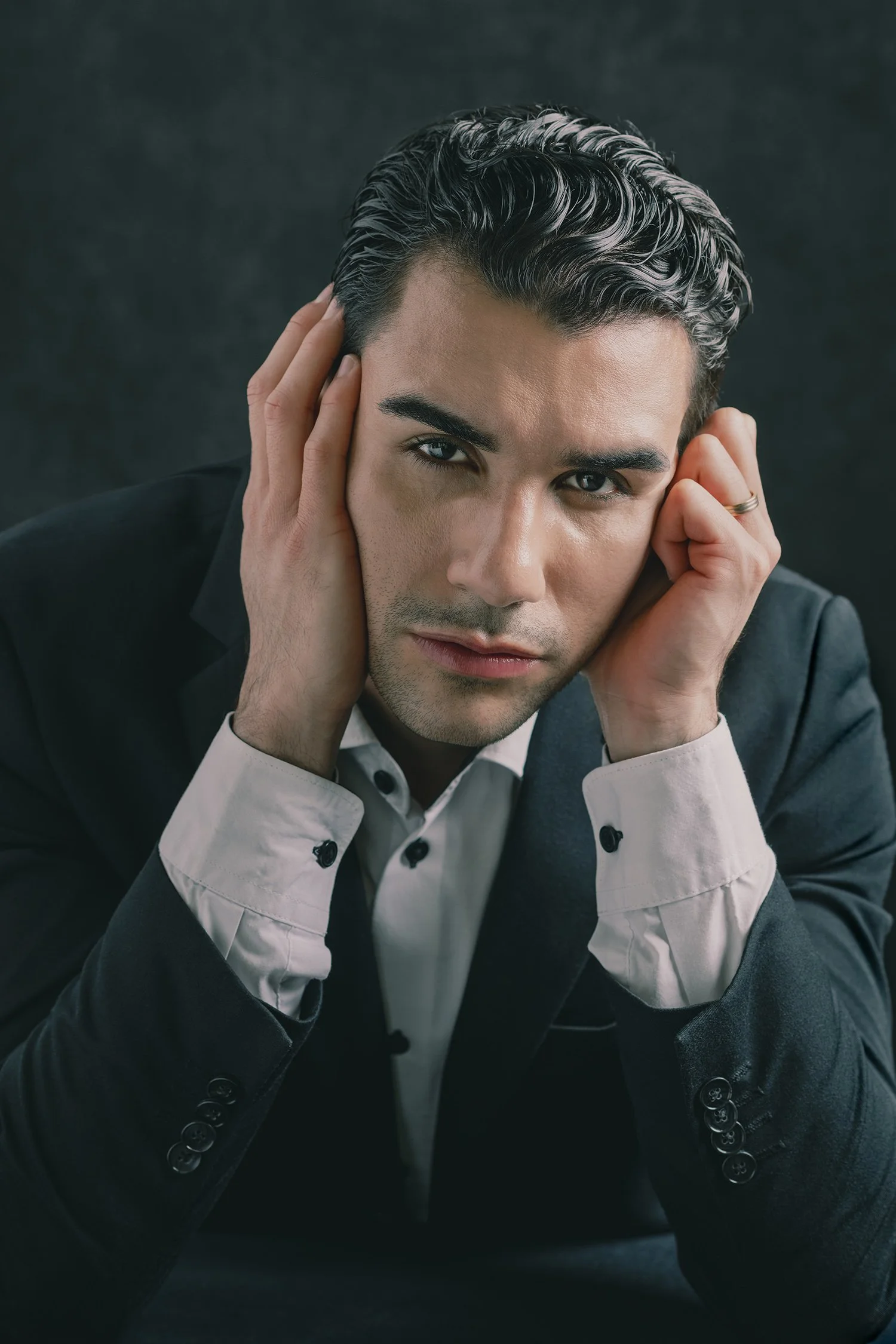 Editorial portrait of man in business suit photographed in studio in Seattle New York and Los Angeles