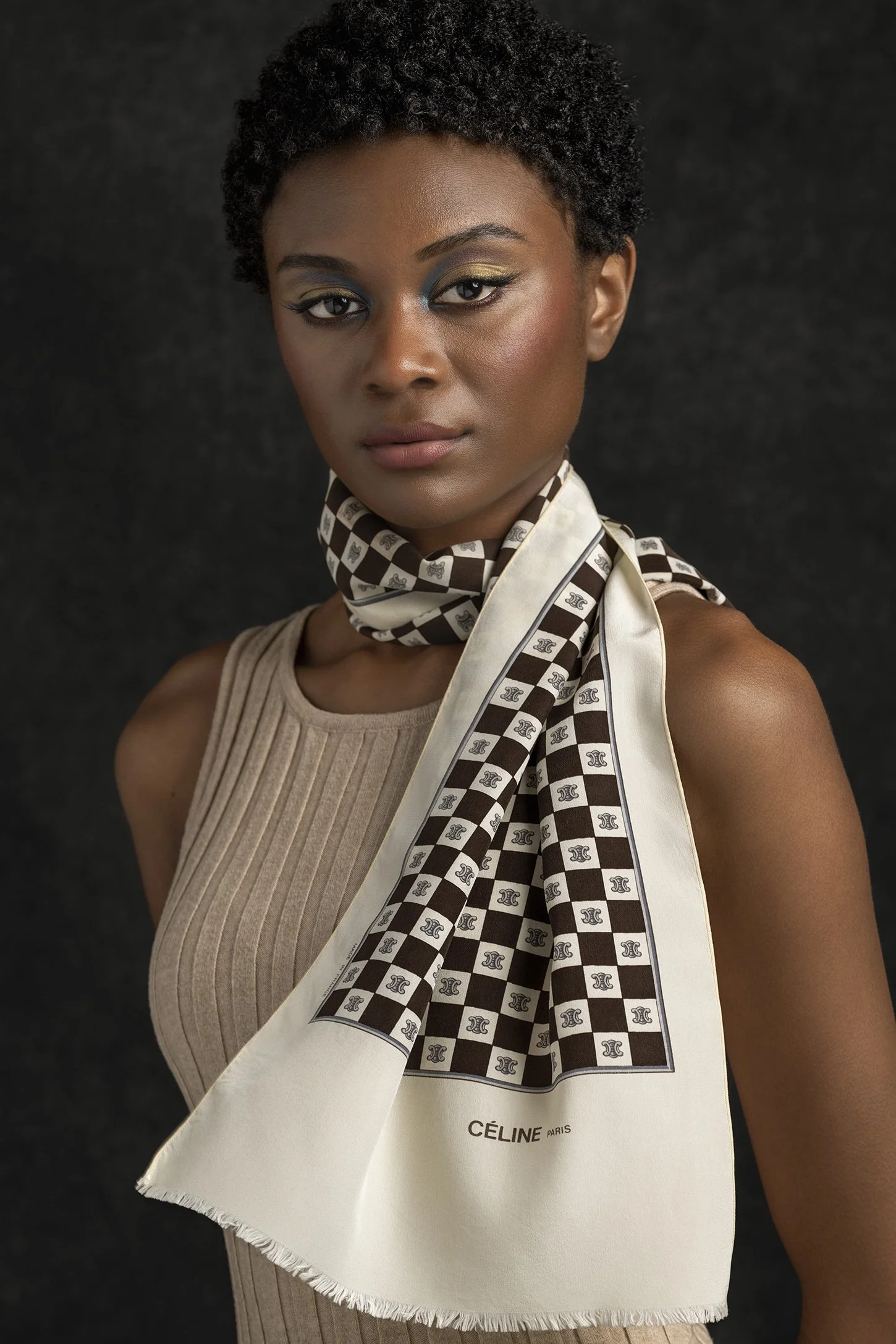 African-American woman wearing silk Celine Paris scarf in studio photographed in studio in Seattle New York and Los Angeles