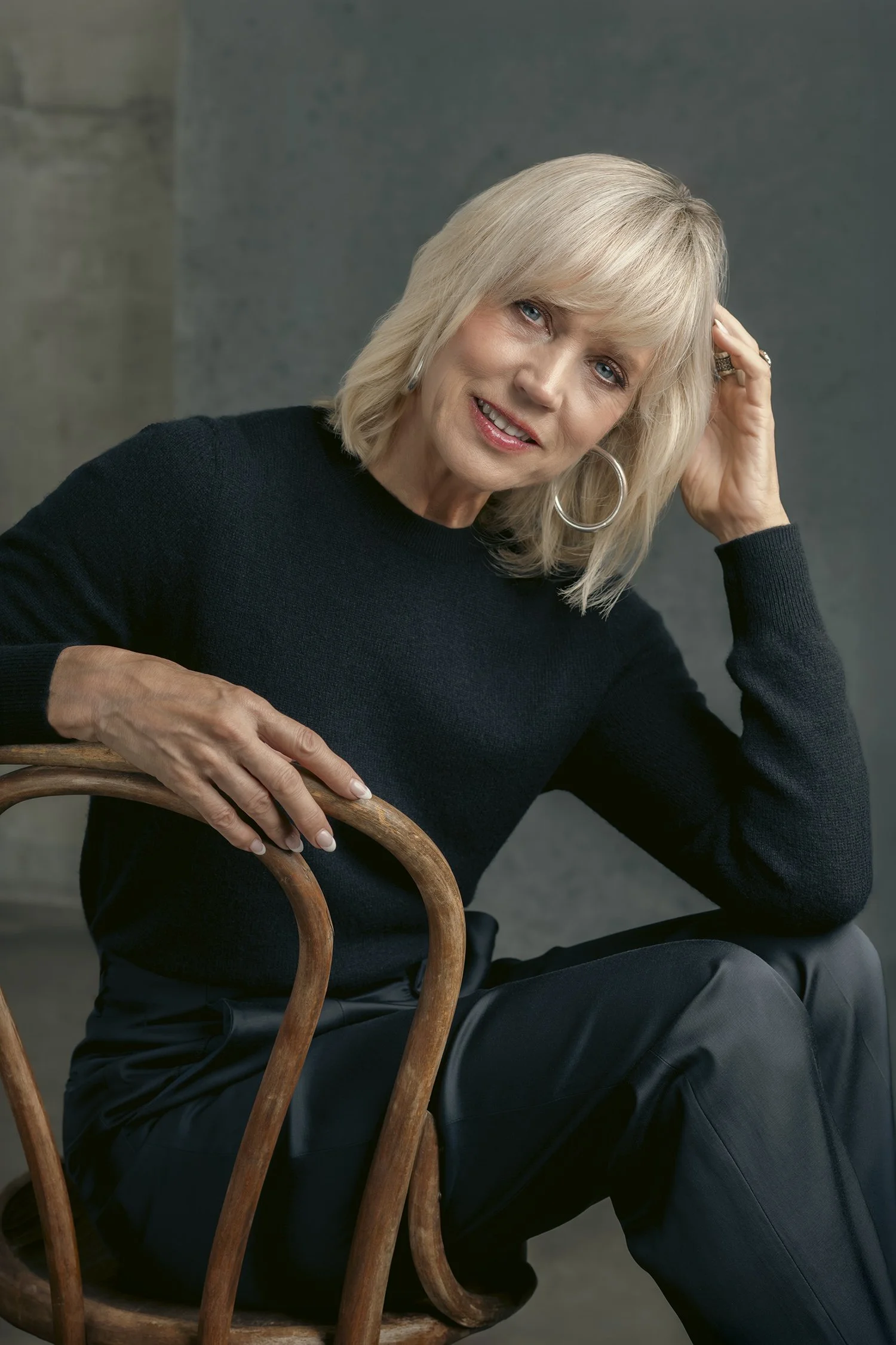 Middle aged attractive woman with blonde hair photographed in studio in headshot portrait setting in Seattle New York and Los Angeles 