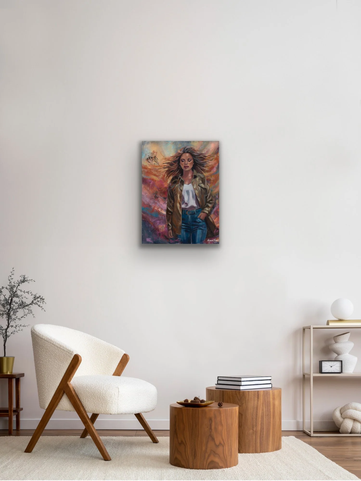 Embrace the Storm painting in a living room with a cream boucle armchair and light wood side table