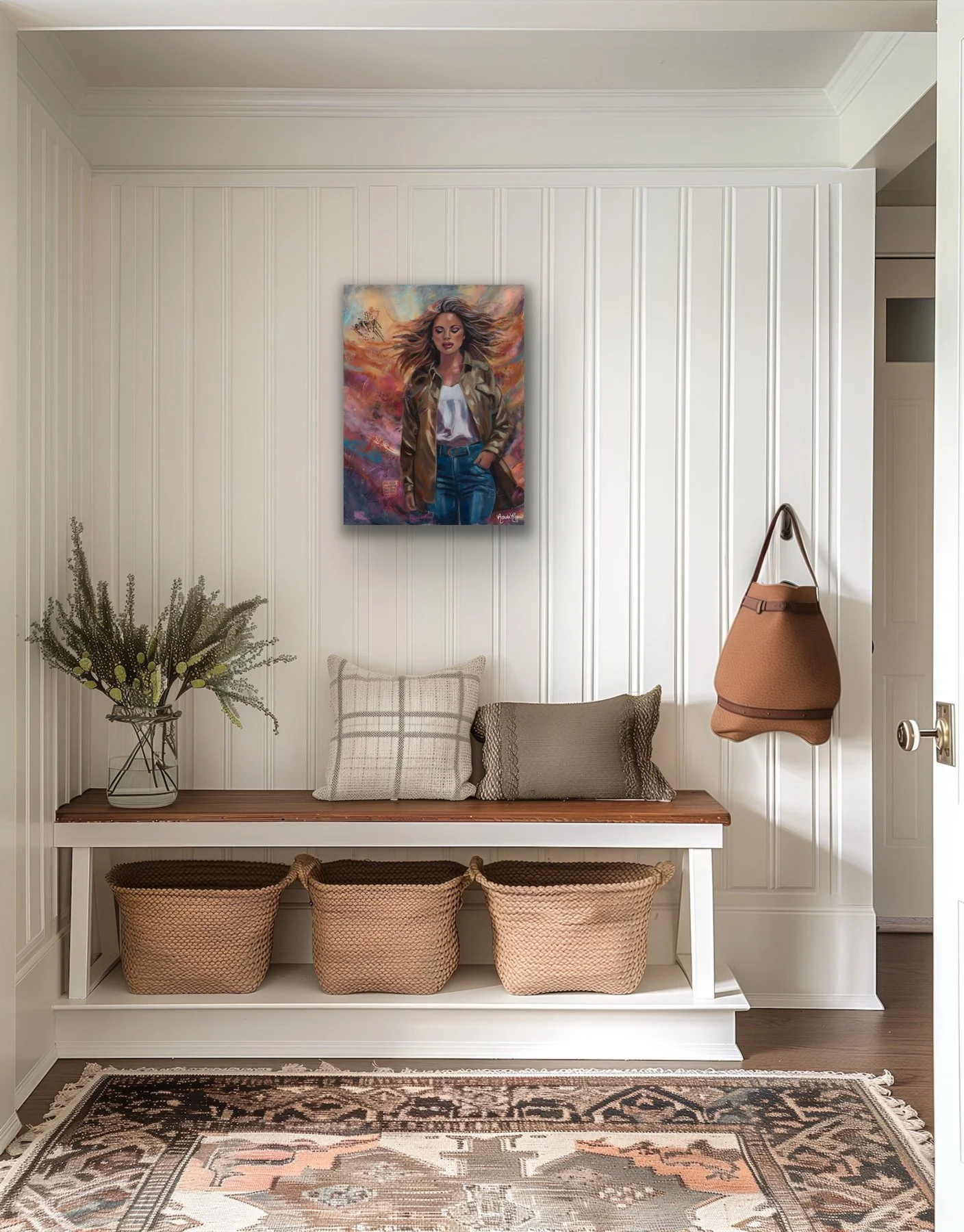 Embrace the Storm painting above a white paneled entryway bench with woven baskets and throw pillows